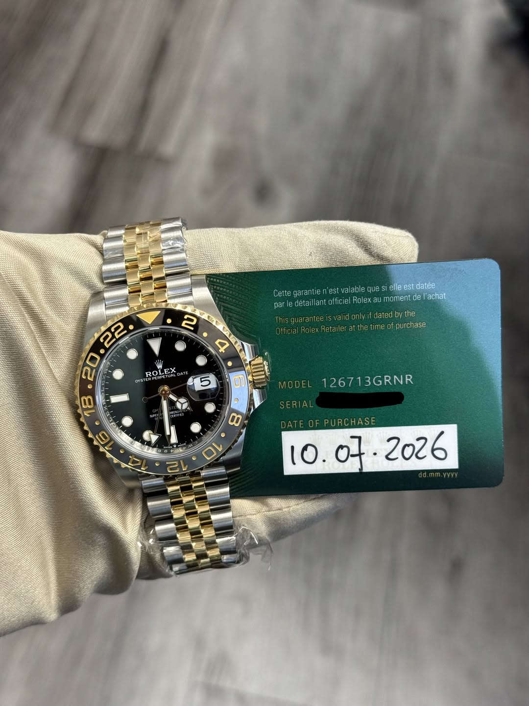 May be an image of wrist watch and text