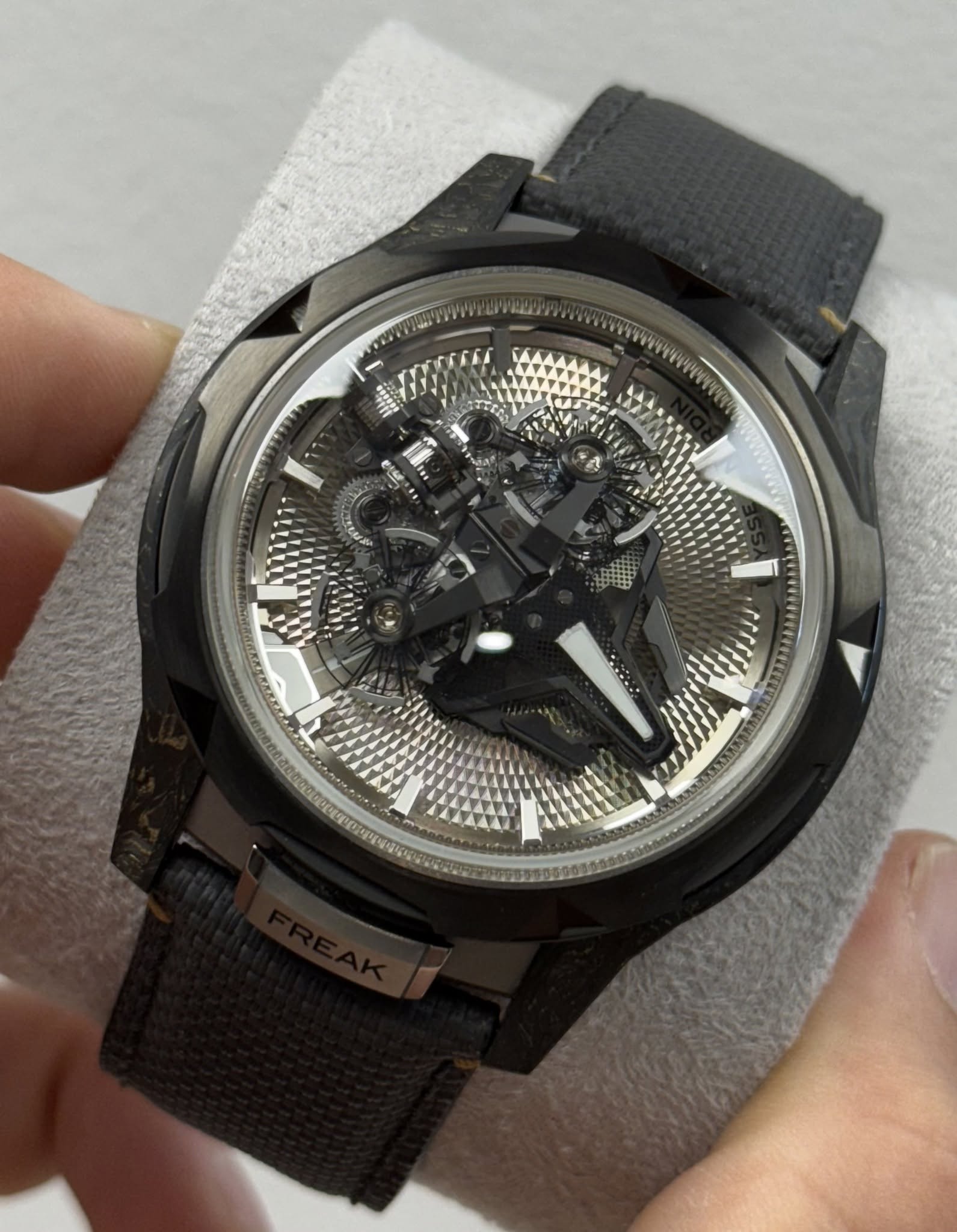 May be an image of wrist watch and text