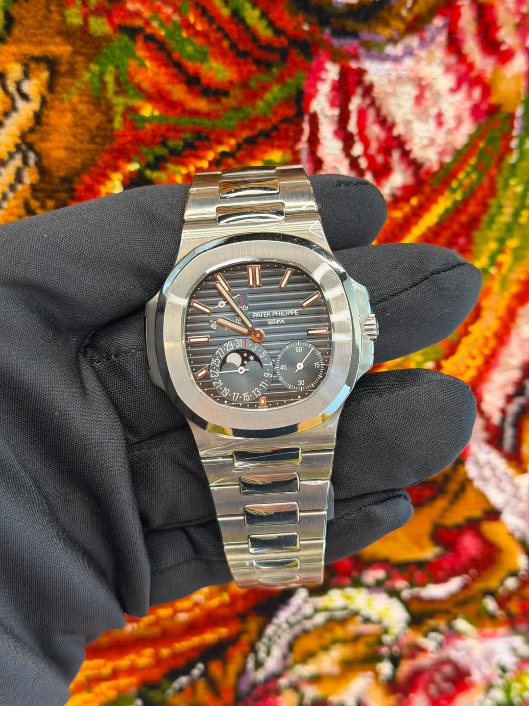 May be an image of wrist watch and text