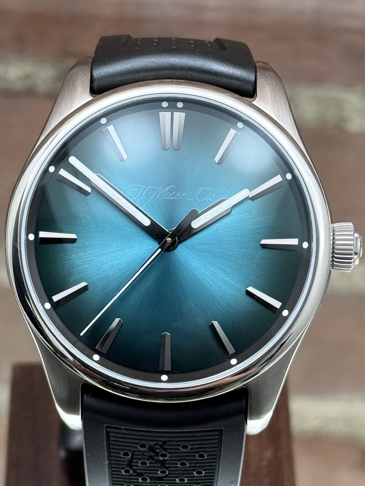 May be an image of wrist watch and text
