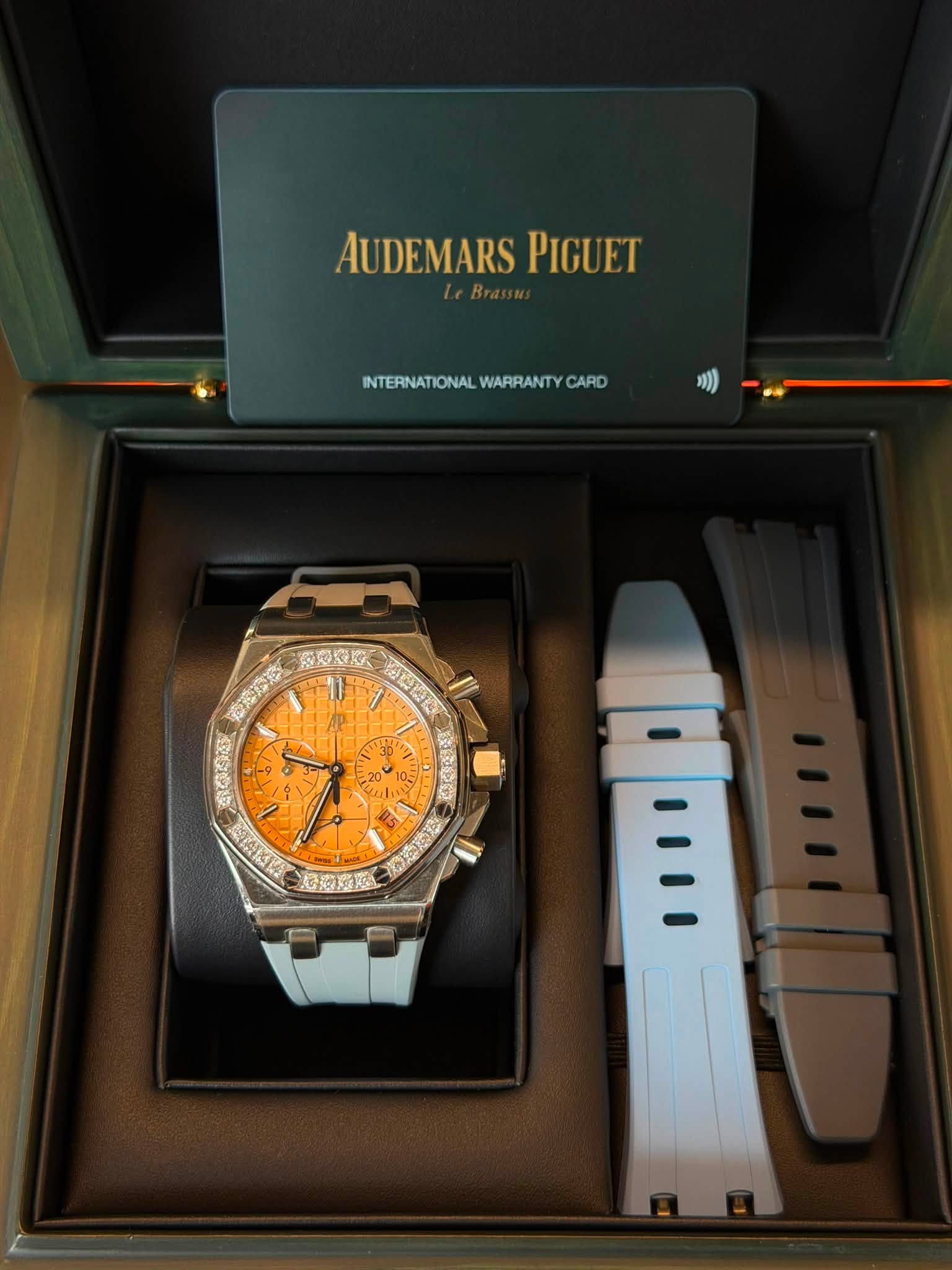 May be an image of wrist watch and text