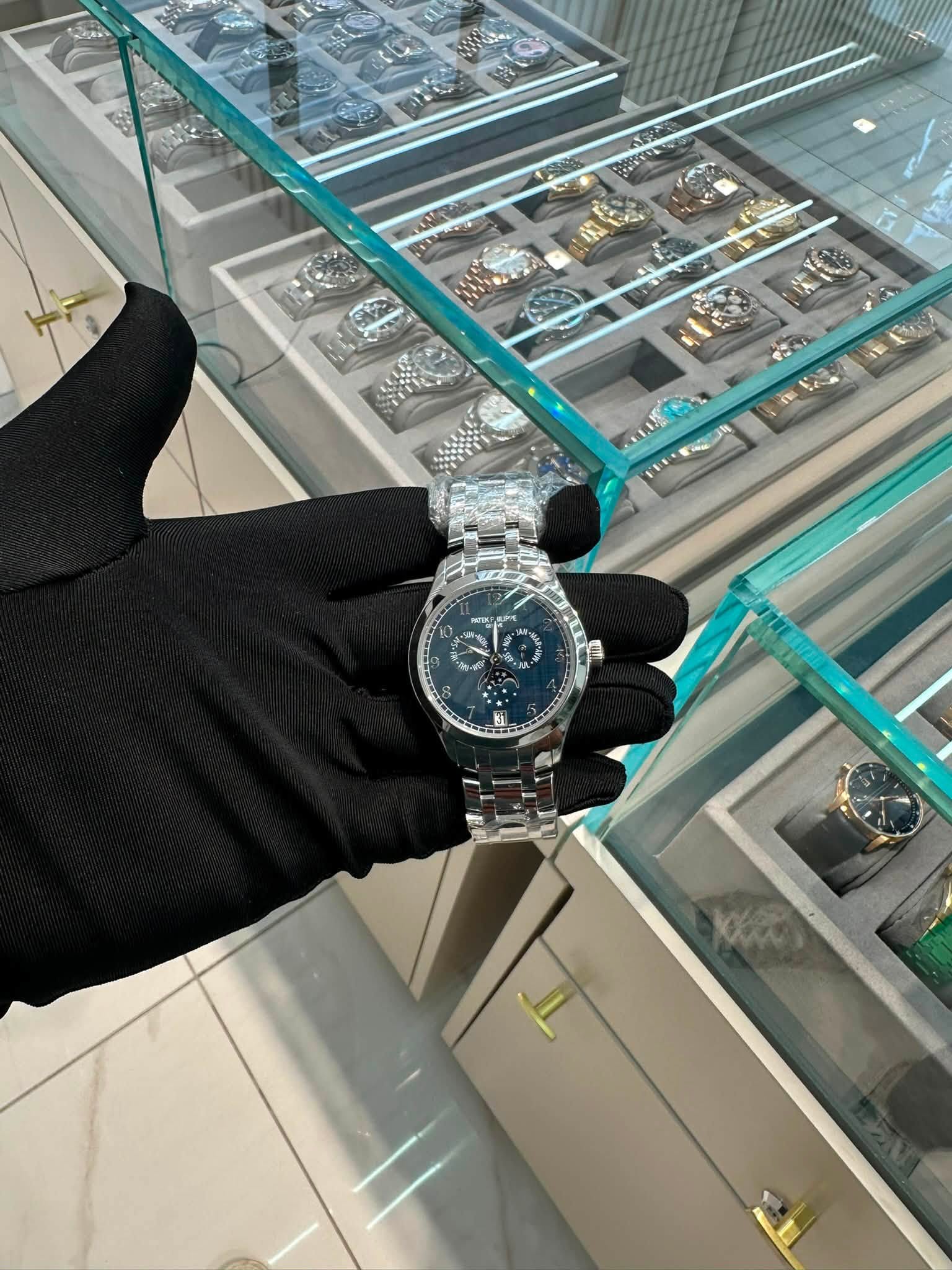 May be an image of wrist watch and text