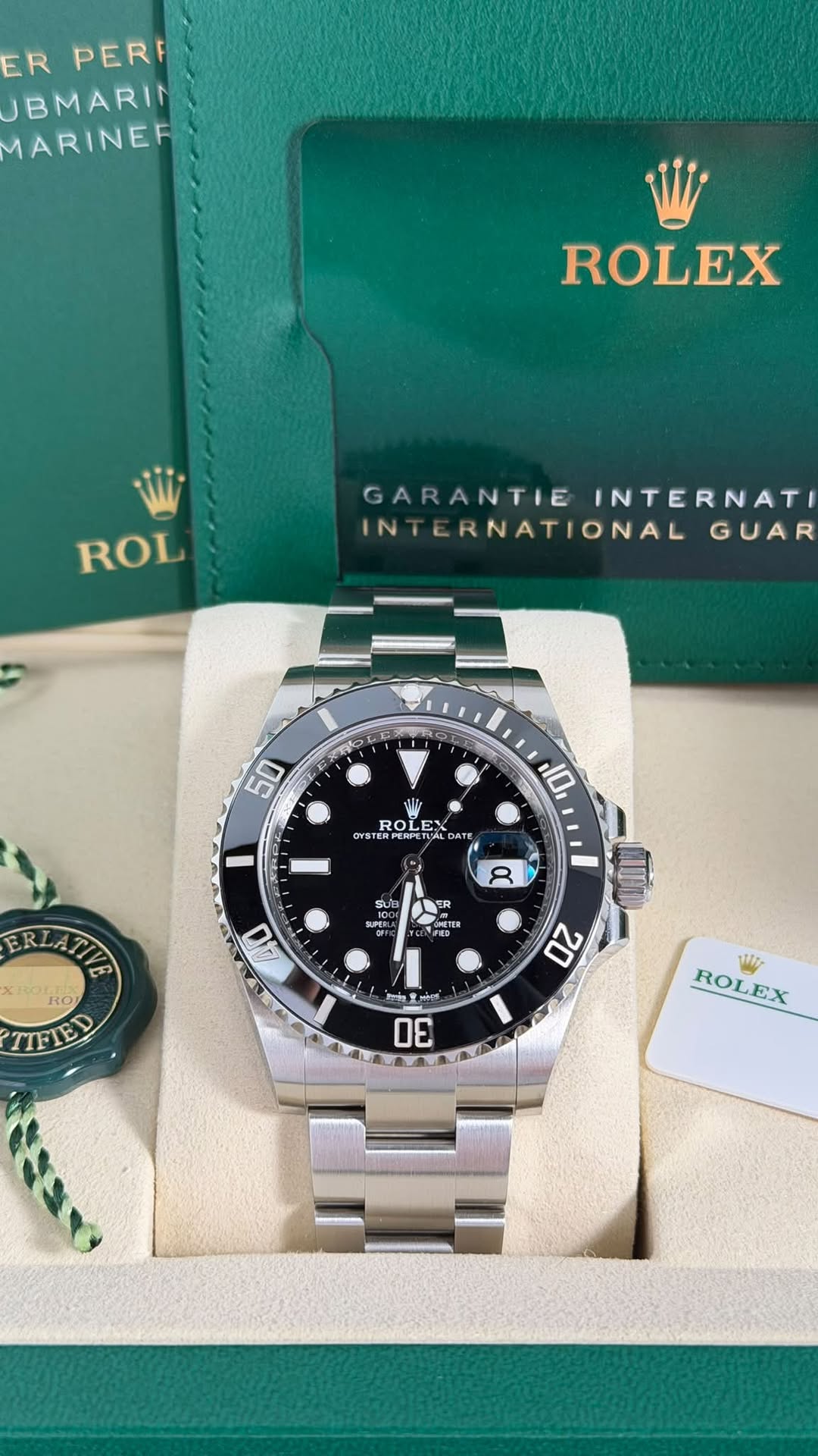 May be an image of wrist watch and text that says 'ER PERF BMARIA MARINER ROLEX ROL GARANTIE INTERNAT INTERNATIONAL GUAR 50 NI ROL OLE OYS ERPERP 10 DAT AT 80 ERLATIV عع 100 S0B…