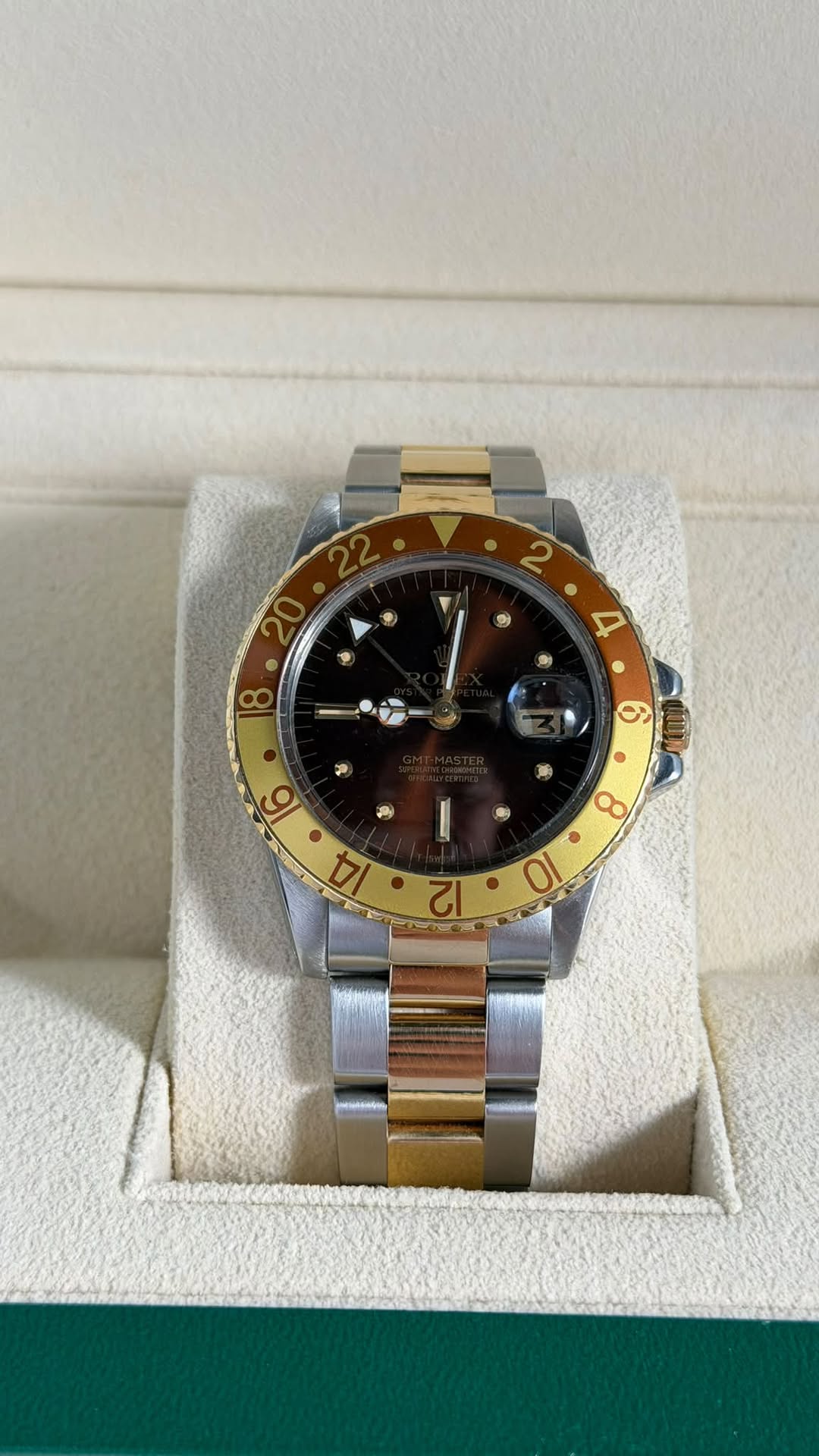 May be an image of wrist watch and text