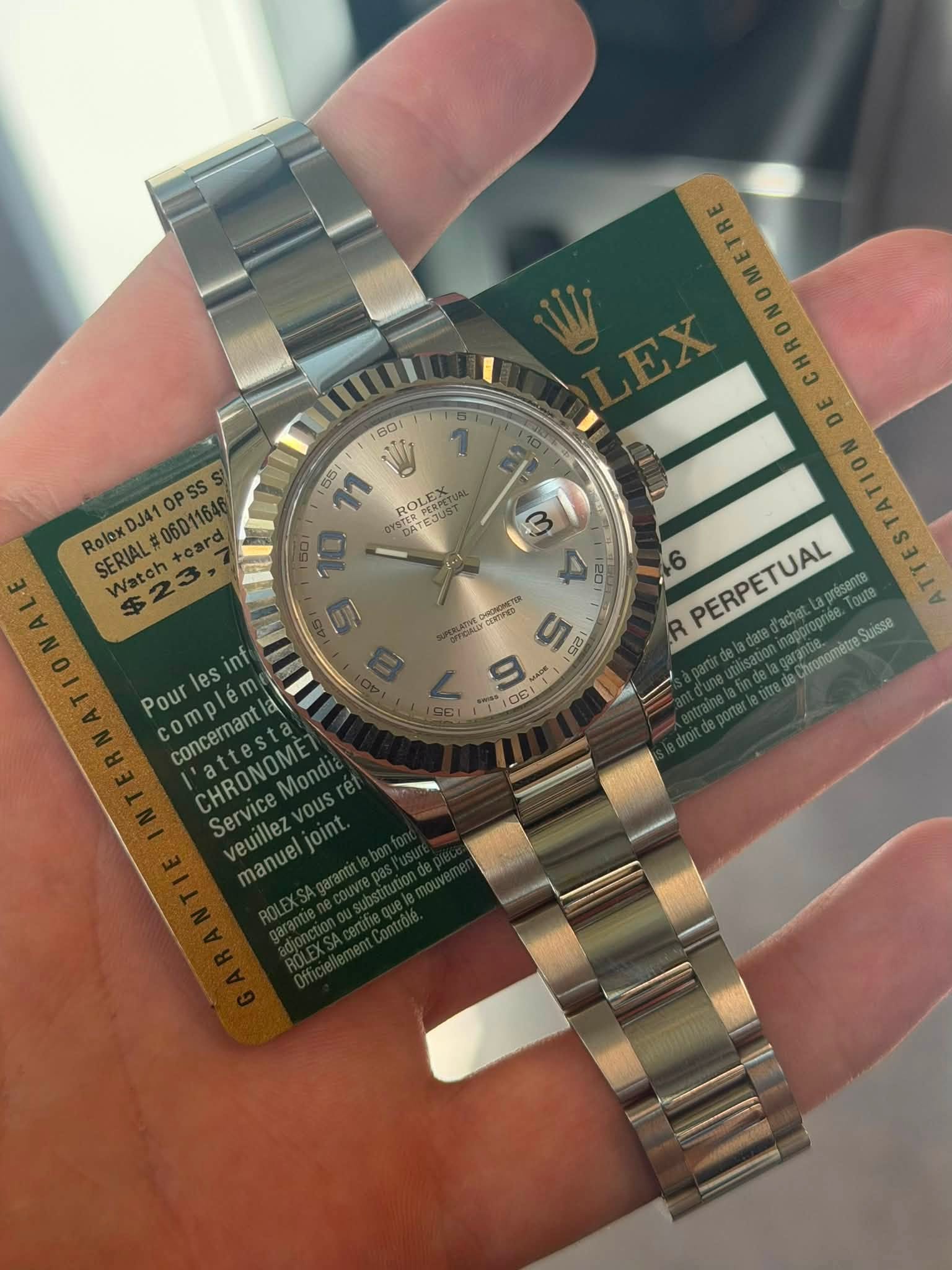 May be an image of wrist watch and text that says ' SESPERPET CRAES ROLE DA Rolox DJ41 RoloxDJ41( Op SERIAL# +eard Watch #06D1164 +oara Watch 23, DE 3 de דו 5 88 oToлe 1 OEI R…