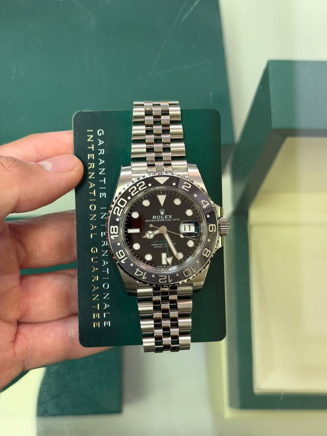 May be an image of wrist watch and text