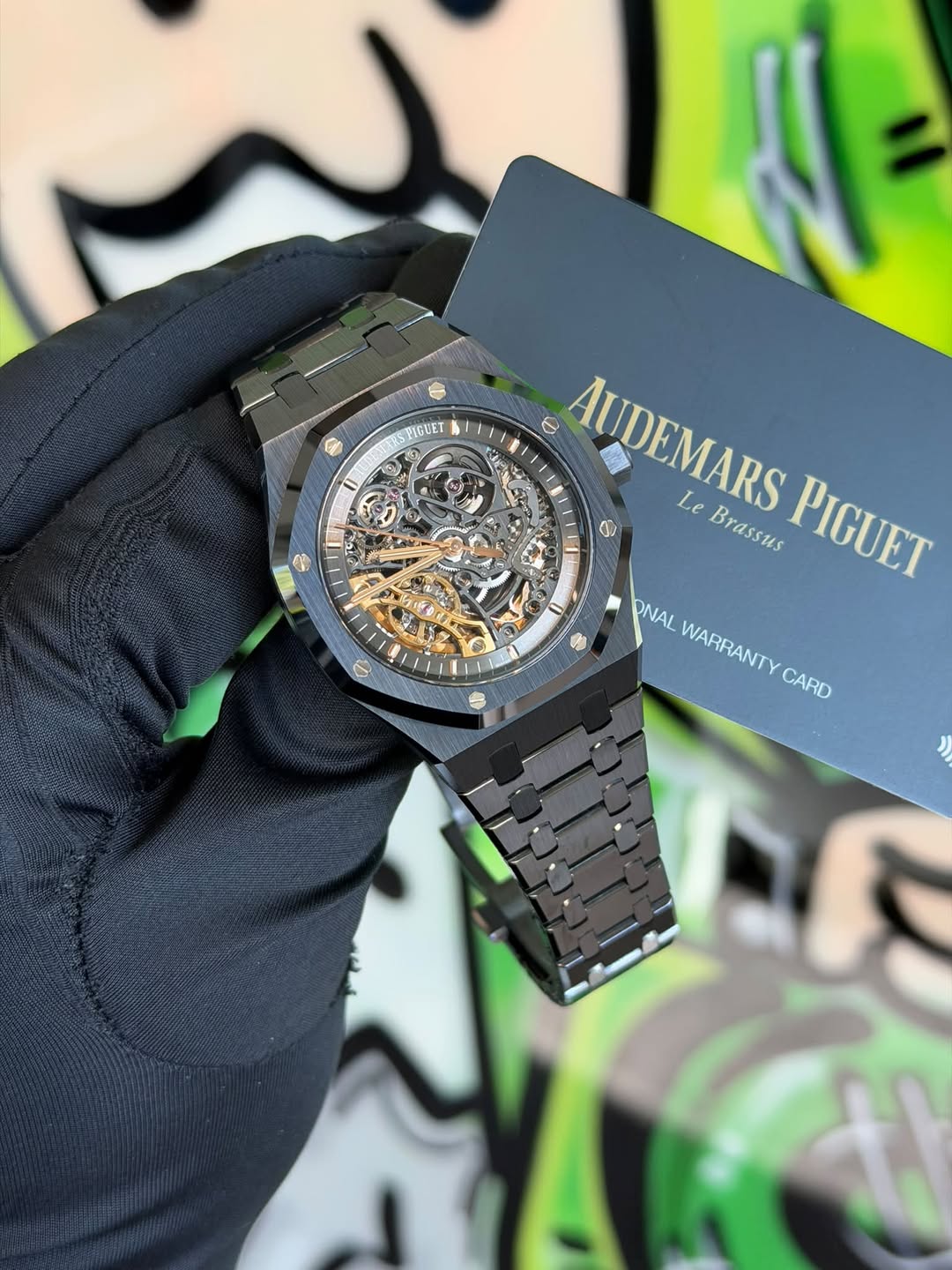 May be an image of wrist watch and text that says 'ASTIGRET 0 e AUDEMARS AUDEMARS e Le Brassus Brassus PIGUET 6 ONAL WARRANTY CARD'