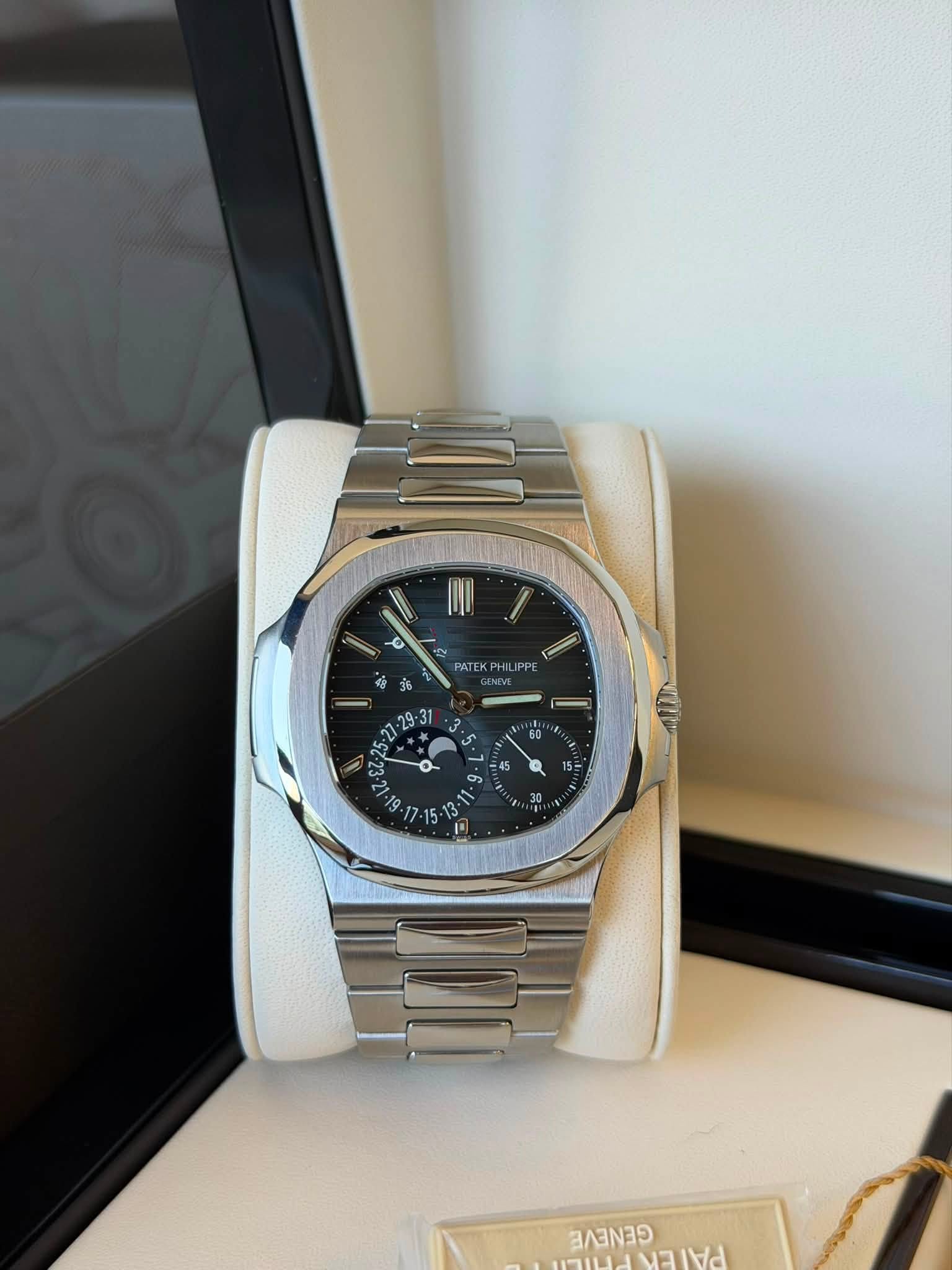 May be an image of wrist watch and text