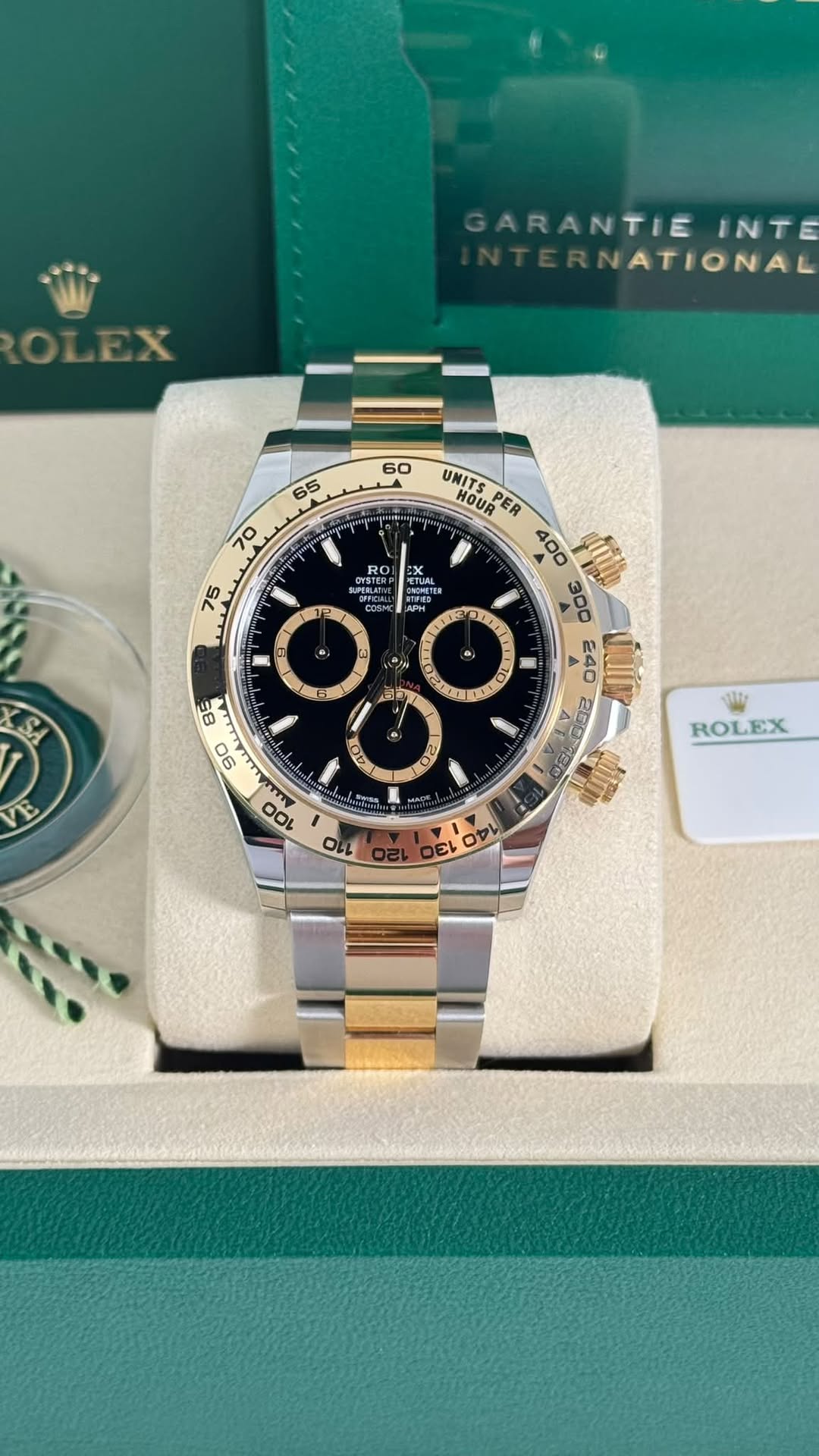 May be an image of wrist watch and text
