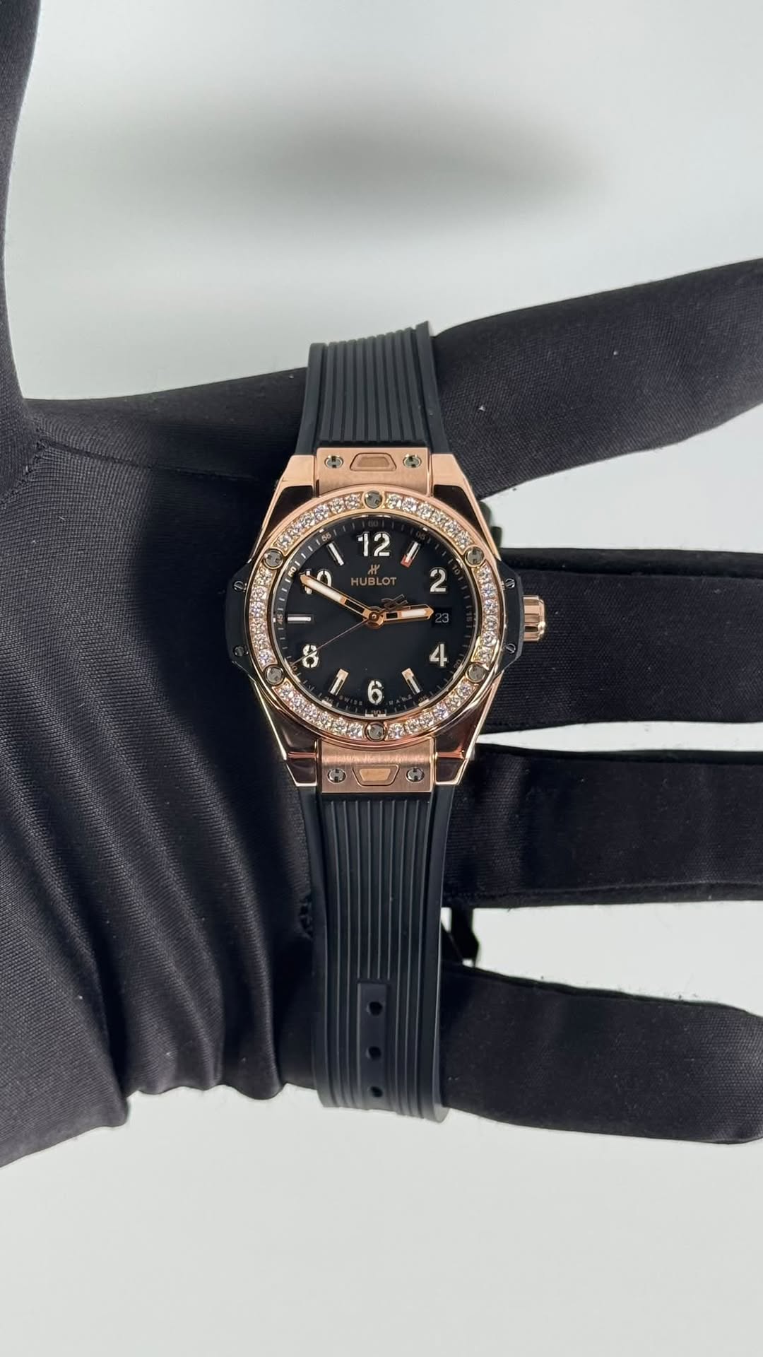 May be an image of wrist watch and text