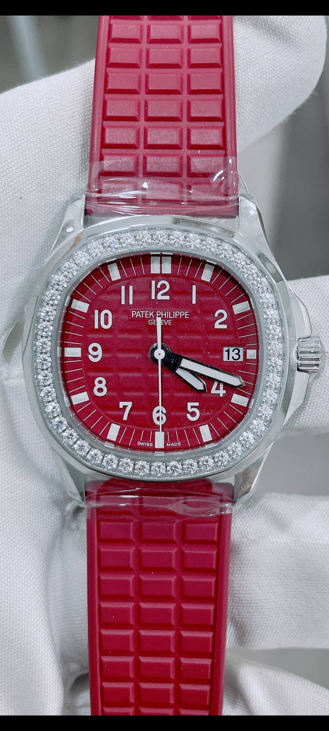 May be an image of wrist watch and text