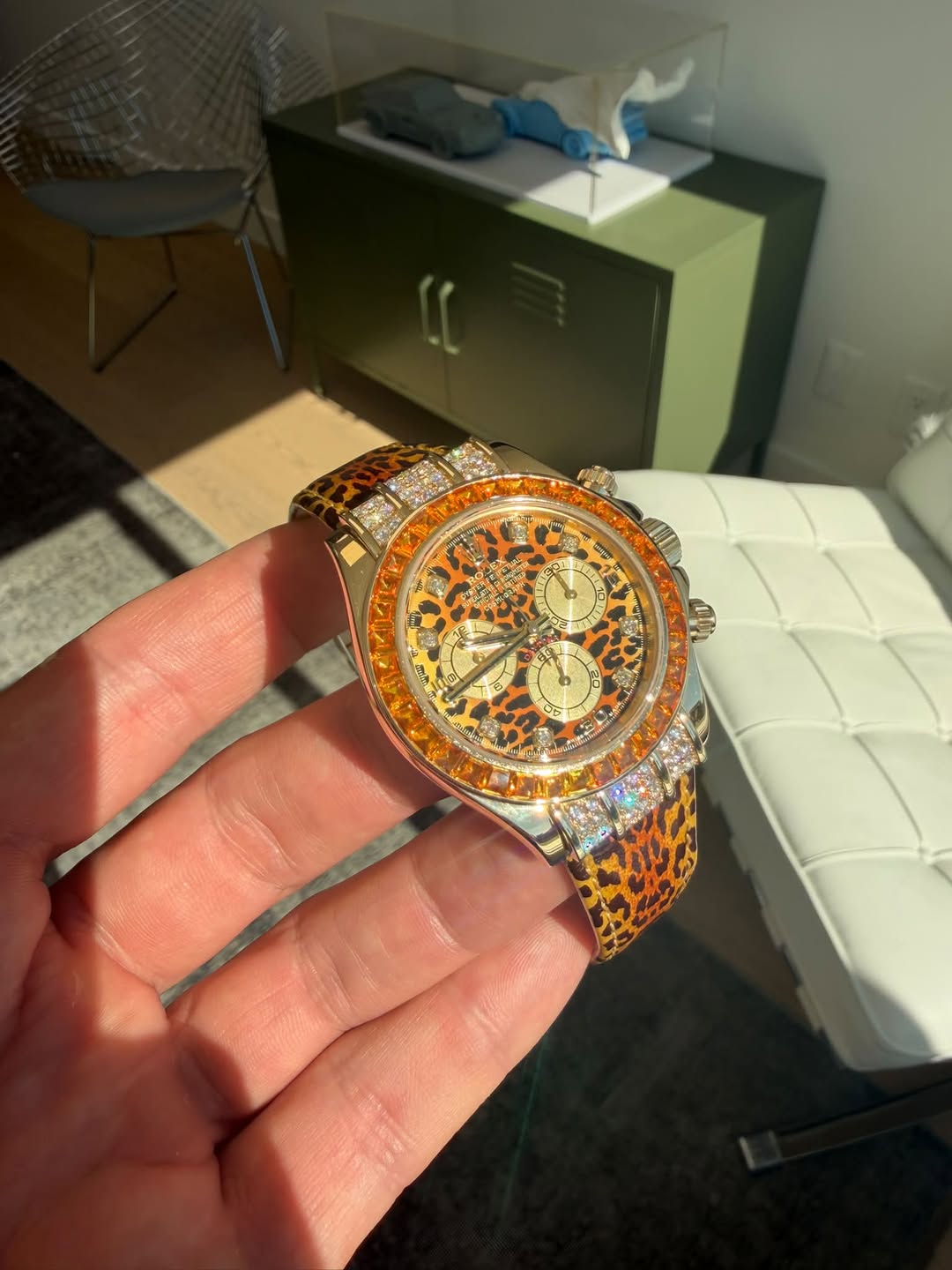 May be an image of wrist watch and text