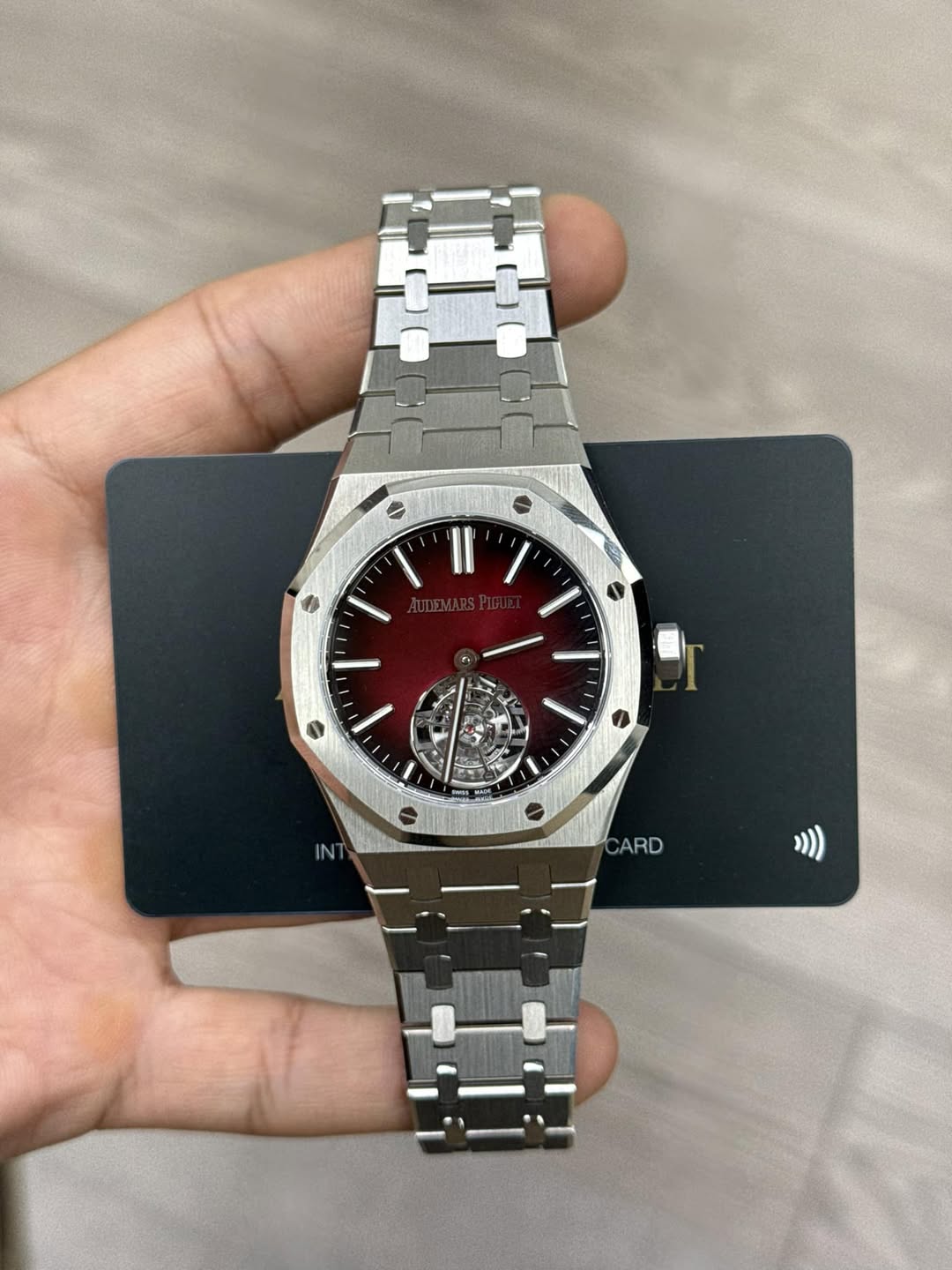 May be an image of wrist watch and text