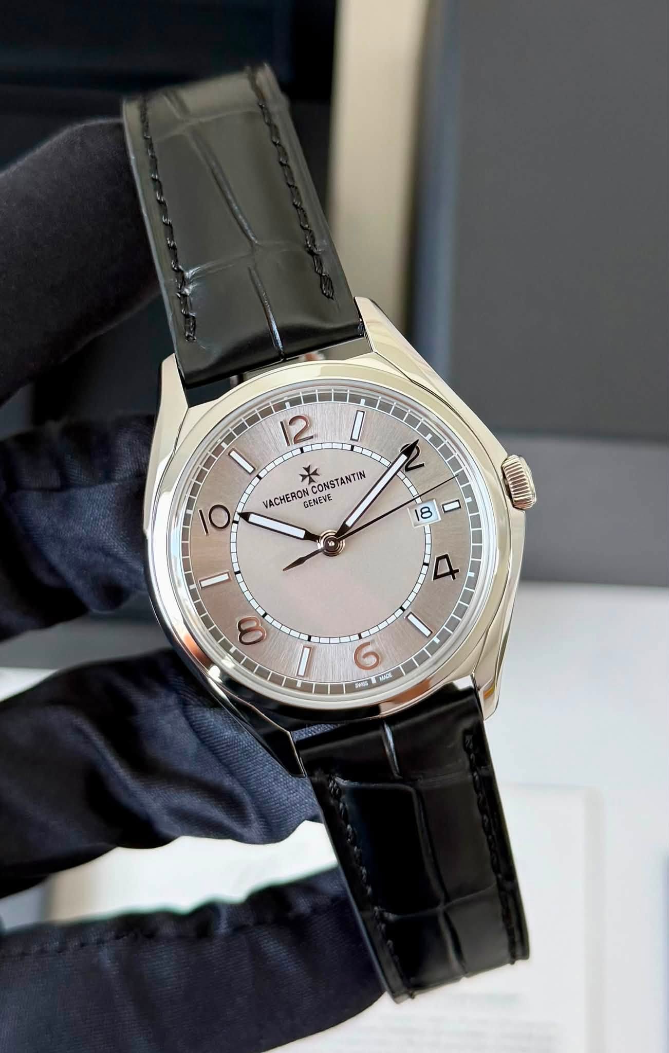 May be an image of wrist watch and text