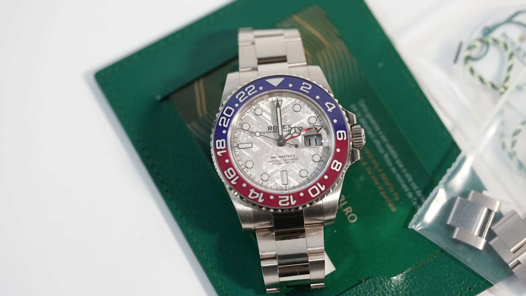 May be an image of wrist watch and text
