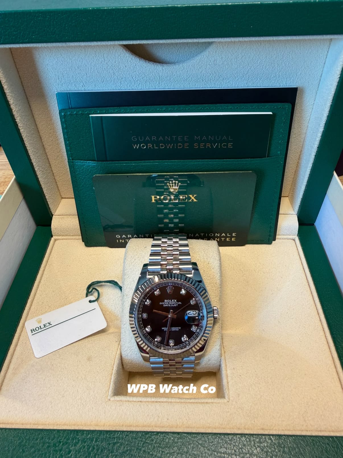 May be an image of wrist watch and text