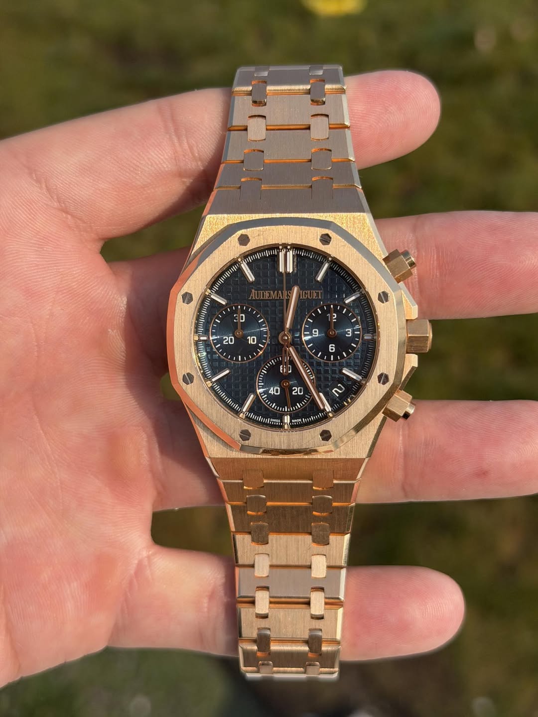 May be an image of wrist watch and text