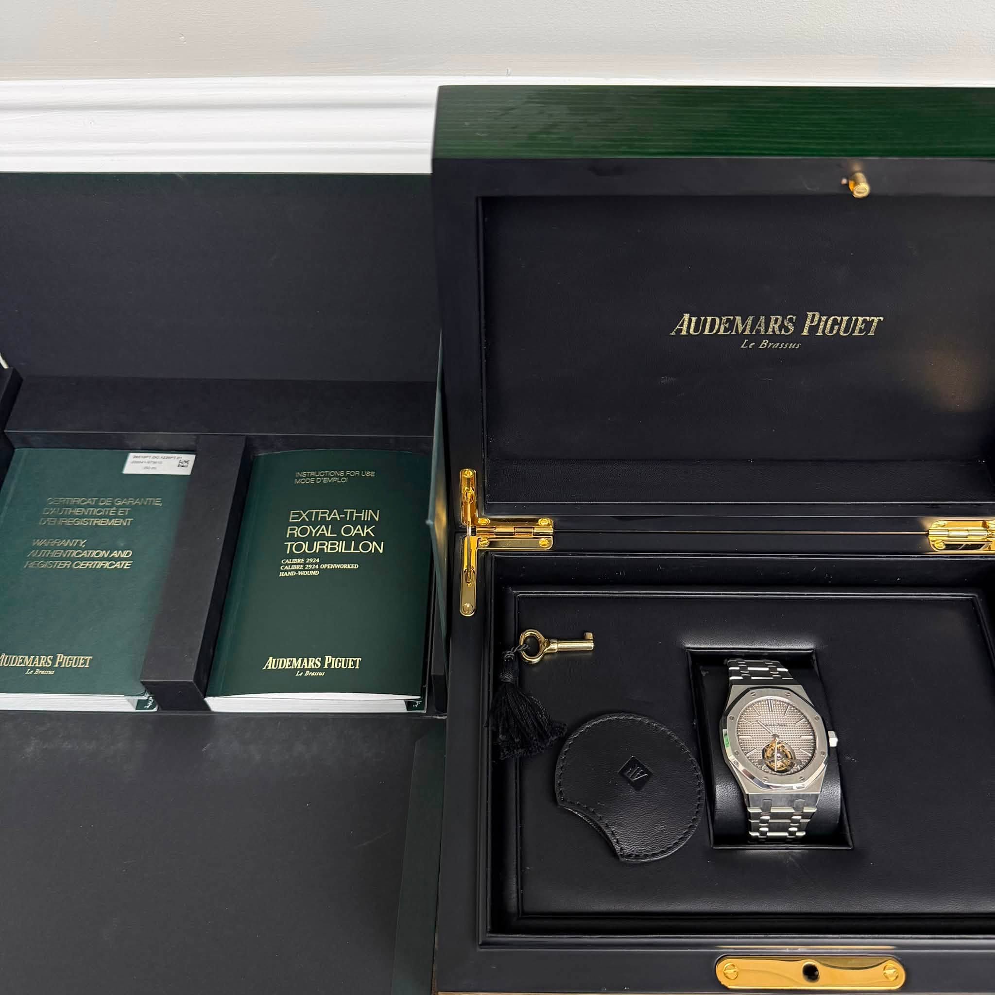 May be an image of wrist watch and text that says 'AUDEM AUDEMARSPIGUET RS PIGUET Le Brasuns EXTRA THIN FOLABLLON ROYAL ROYAL CAK TOURBILLON ឈកស AEMARS TEMARSPITTIET PIGTET…