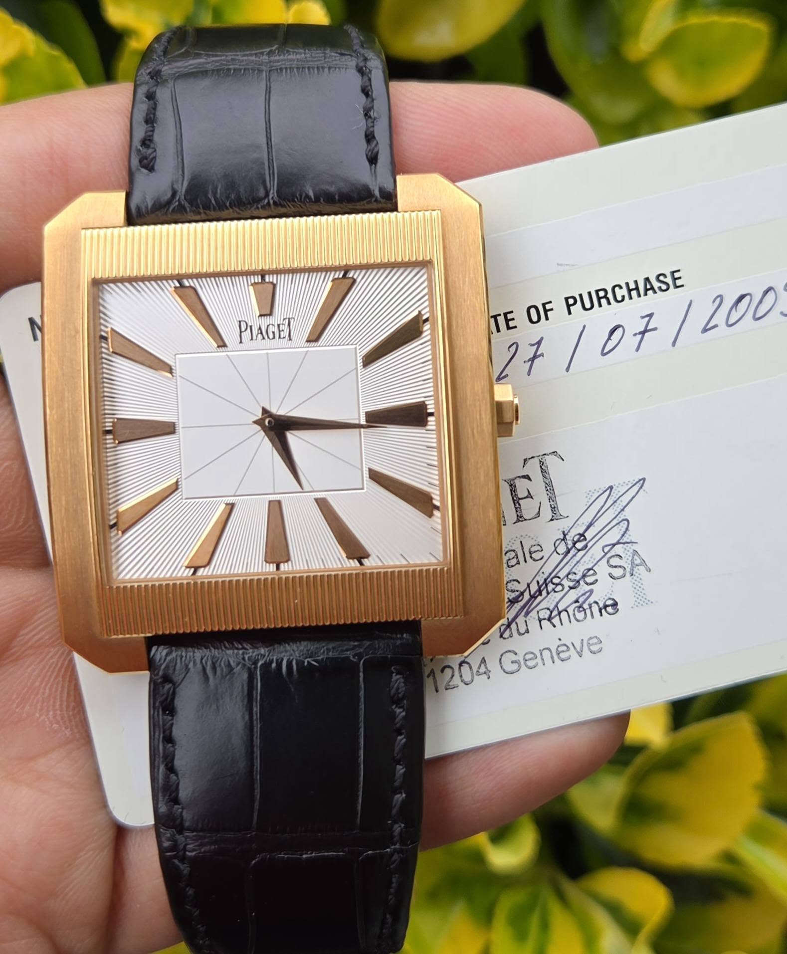 May be an image of wrist watch and text that says '18 PIAGET TEOF PURCHASE PURCHASE TE OF 27/ /07/200 /07 Eл ET SlsseSA SA eu Rhone 204 Geneve'