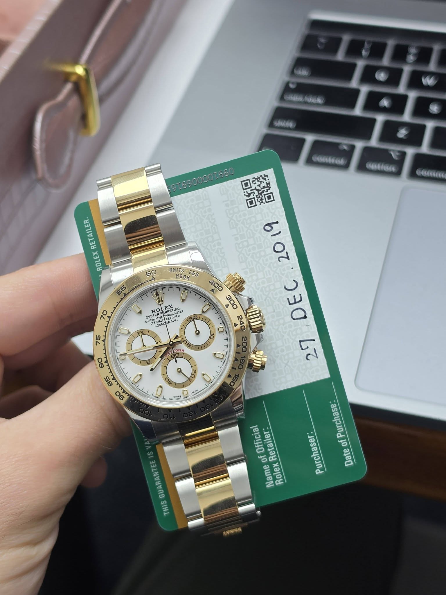 May be an image of wrist watch and text