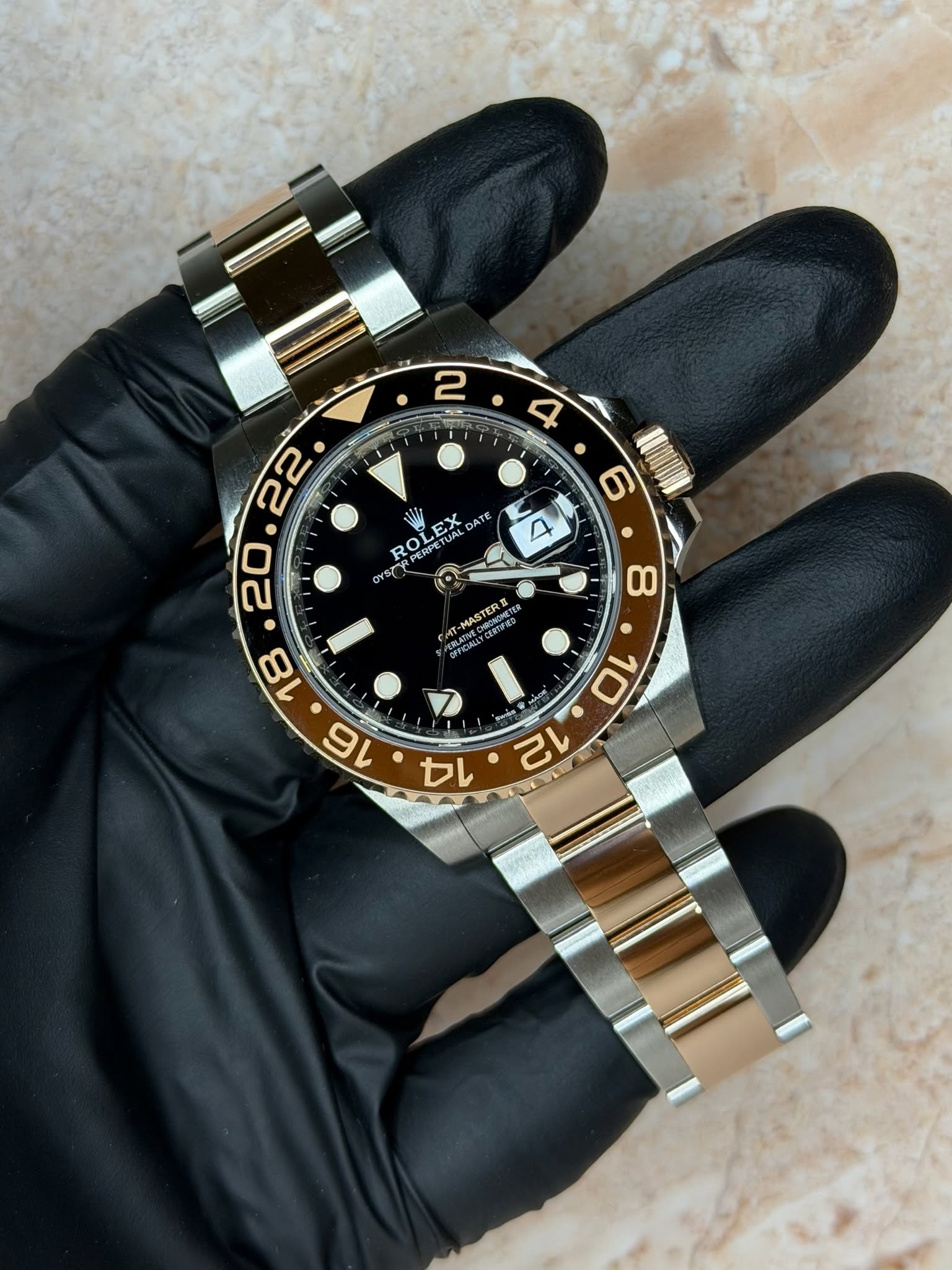 May be an image of wrist watch and text