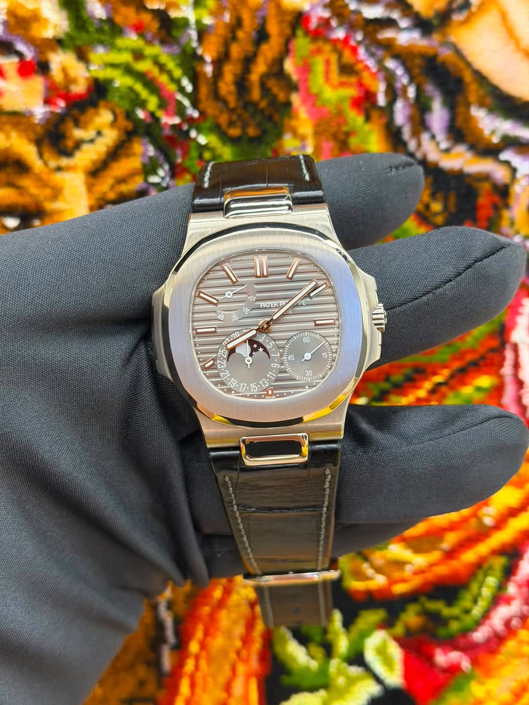May be an image of wrist watch and text