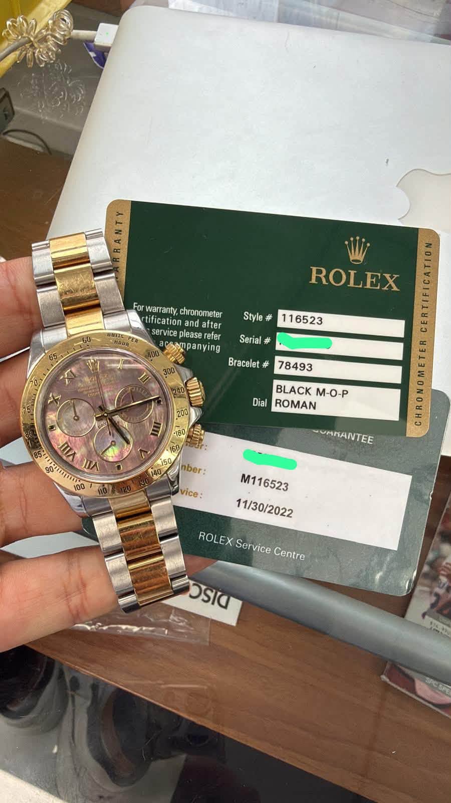 May be an image of wrist watch and text that says 'For Forwaranty.chronometer warranty, chronometer tification dafter service please mpanying Bracelet Style 116523 Serial دل…