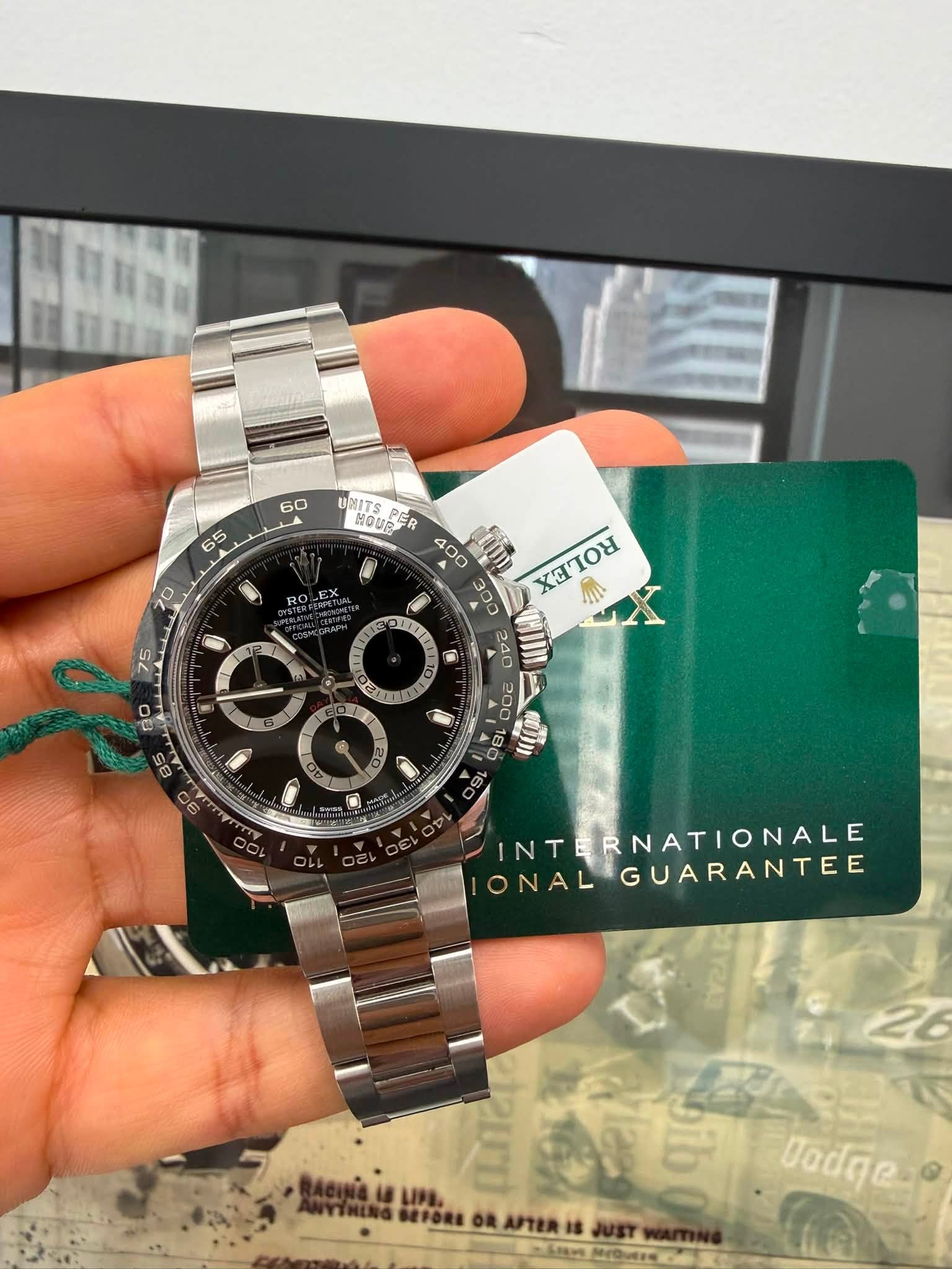 May be an image of wrist watch and text