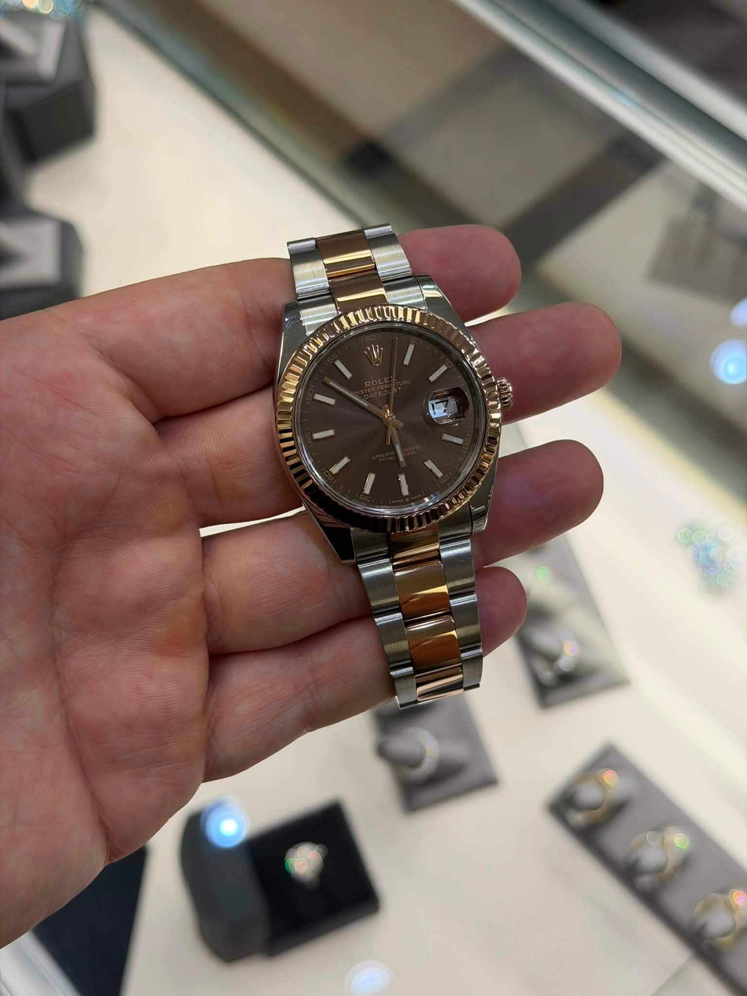 May be an image of wrist watch
