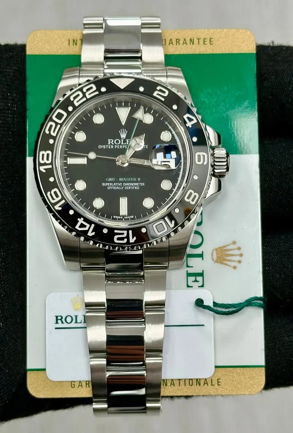 May be an image of wrist watch and text that says 'IN JARANTEE ROLF OYSTER ROLF PERPE 18 لبات GIME WASTER SUPERLATIV SUPERLATINEORHONTER NAE OFFICIALLY CERTIFIED CHRONOMETER TER…