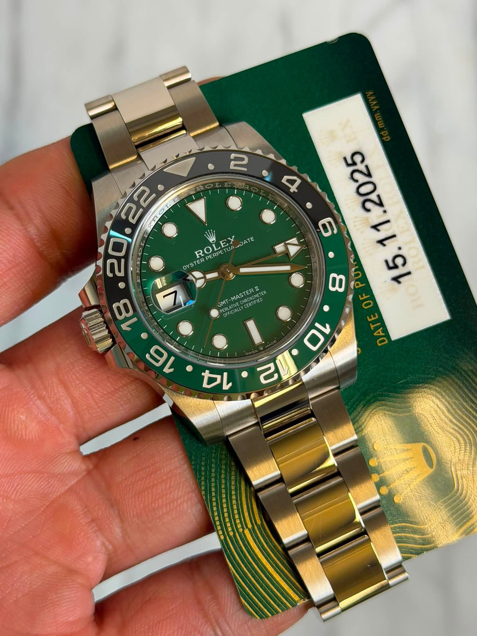 May be an image of wrist watch and text