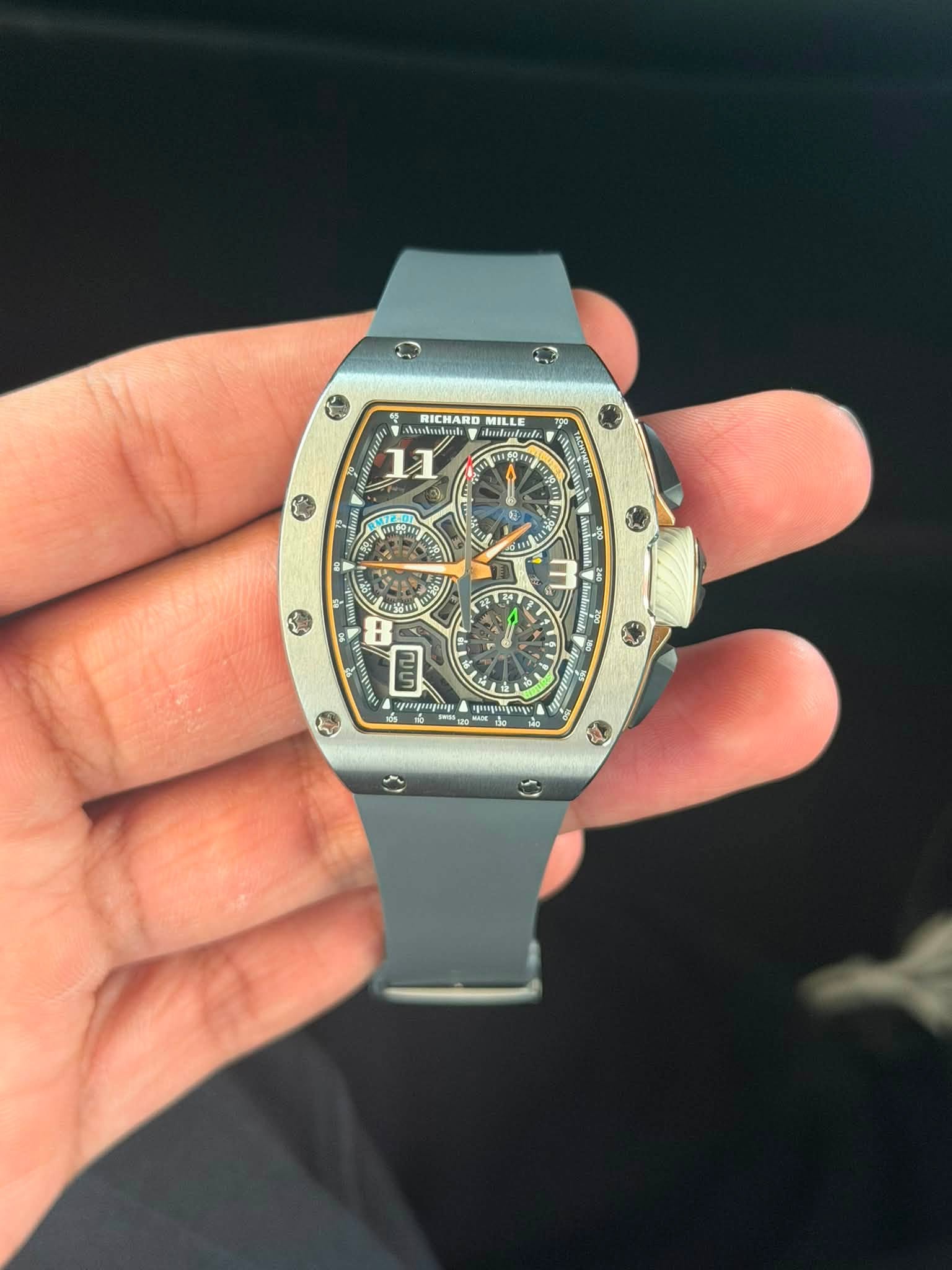 May be an image of wrist watch and text