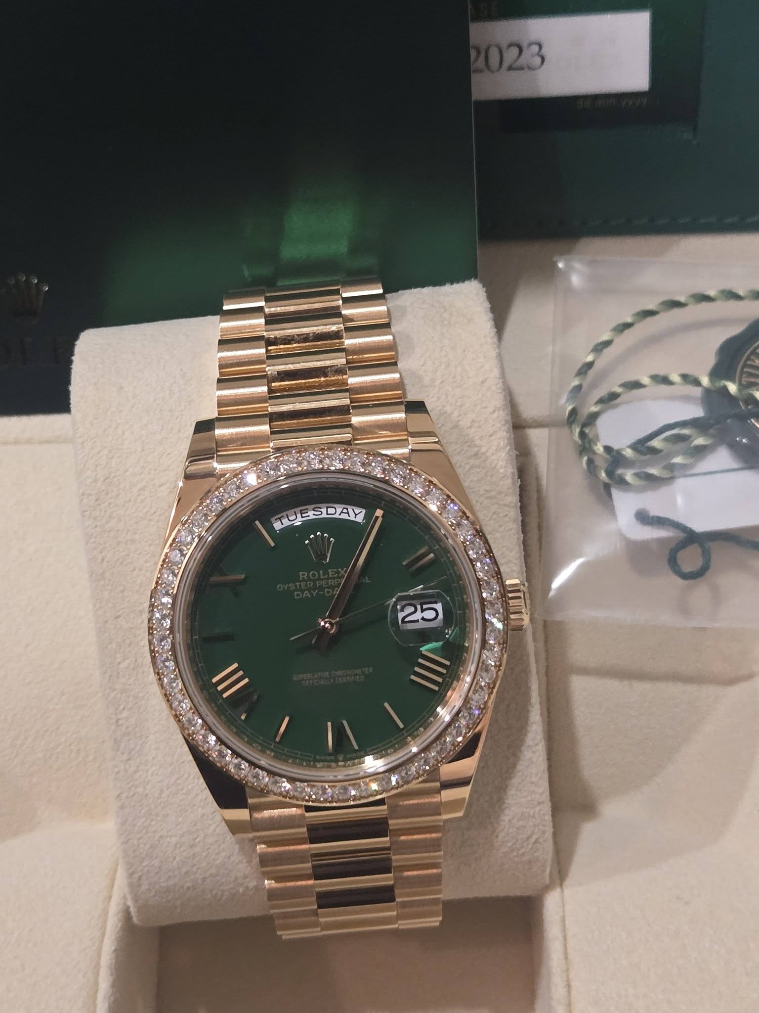 May be an image of wrist watch and text