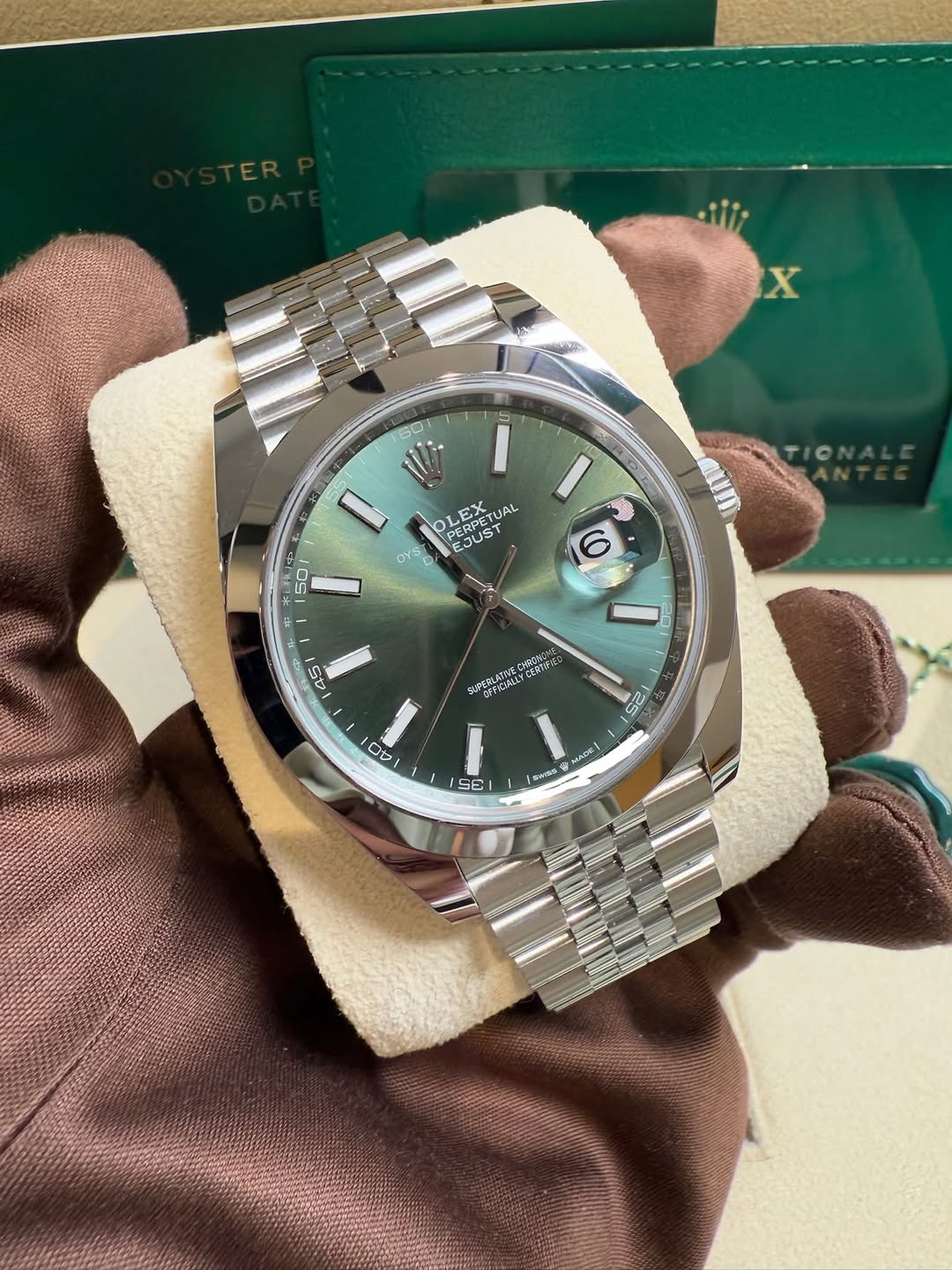 May be an image of wrist watch and text