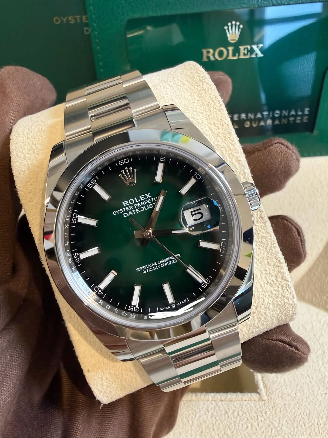 May be an image of wrist watch and text
