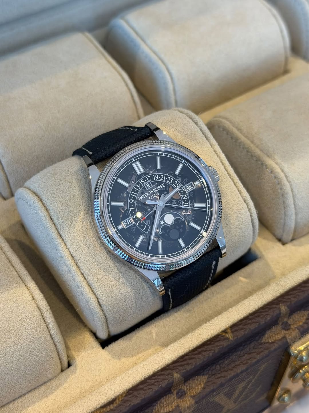 May be an image of wrist watch and text