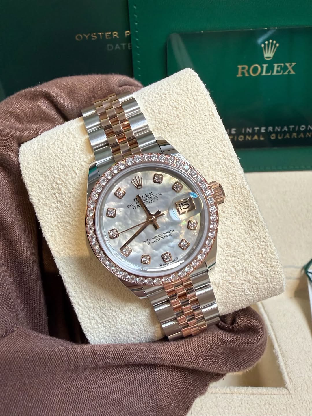 May be an image of wrist watch and text