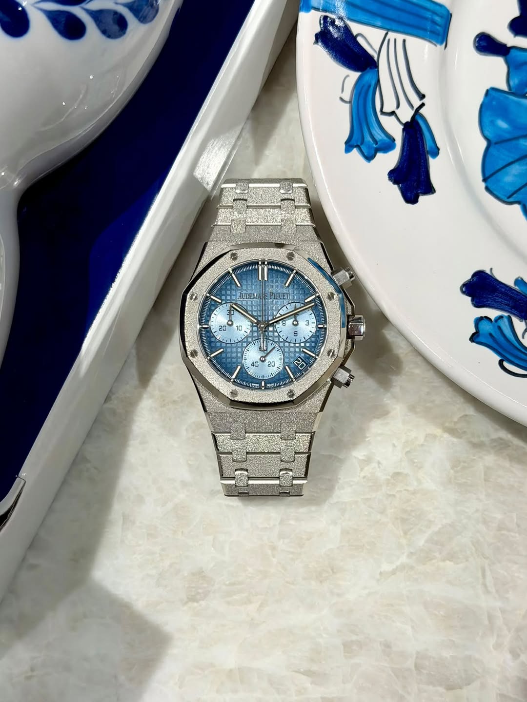 May be an image of wrist watch and text