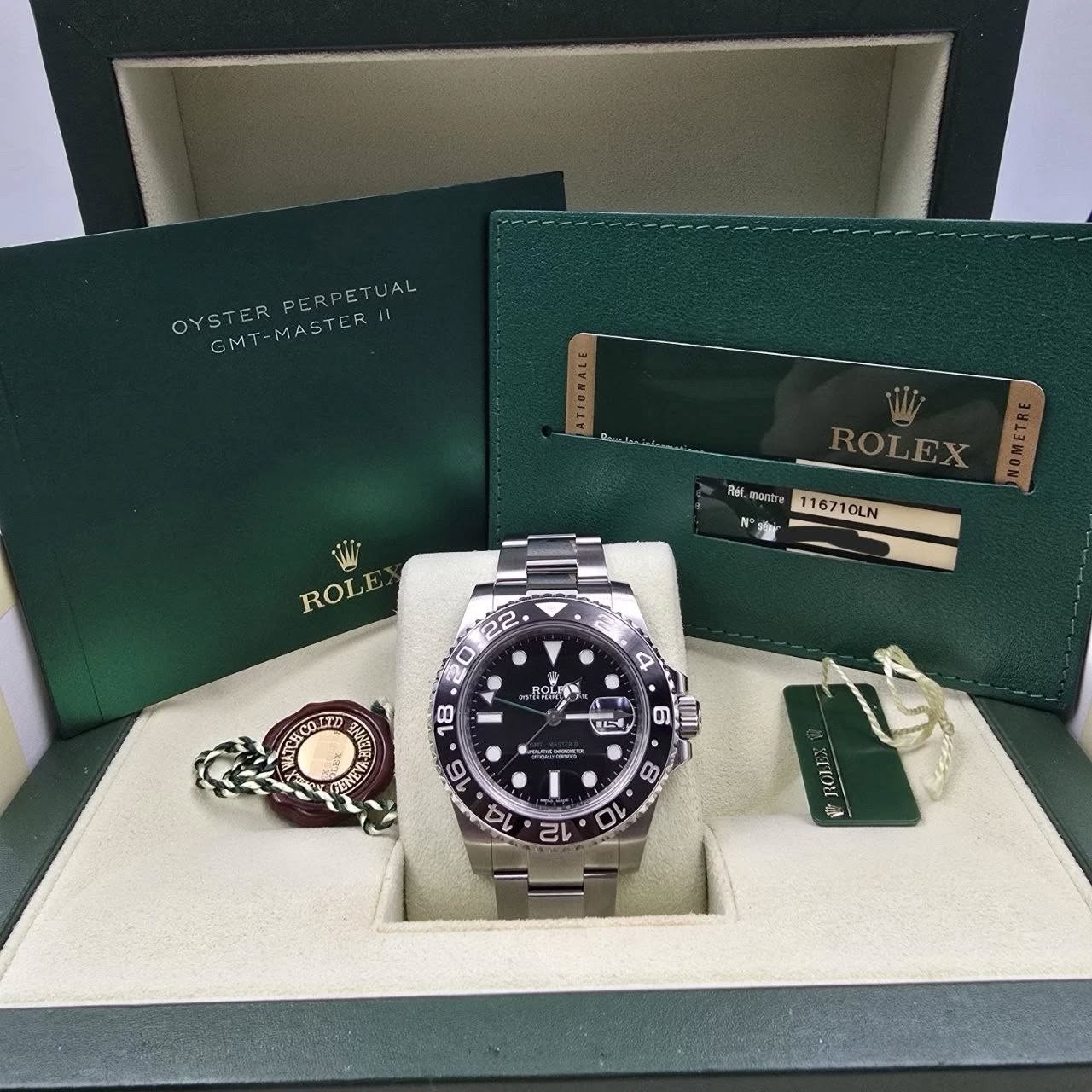 May be an image of wrist watch and text that says 'PERPETUAL OYSTER OYSTERPERPETUAL OY GMT-MASTER GMT- GMT-MASTER Wi ROLE ROLEX Ret. montre 1167 71OLN 116710LN ROLIS TL 科 6 종년냉령…