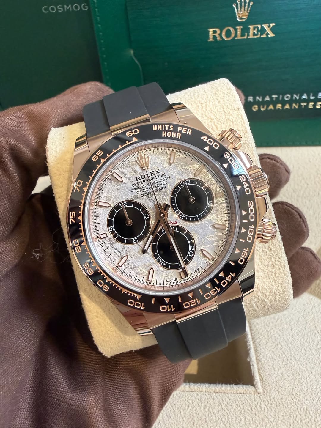 May be an image of wrist watch and text