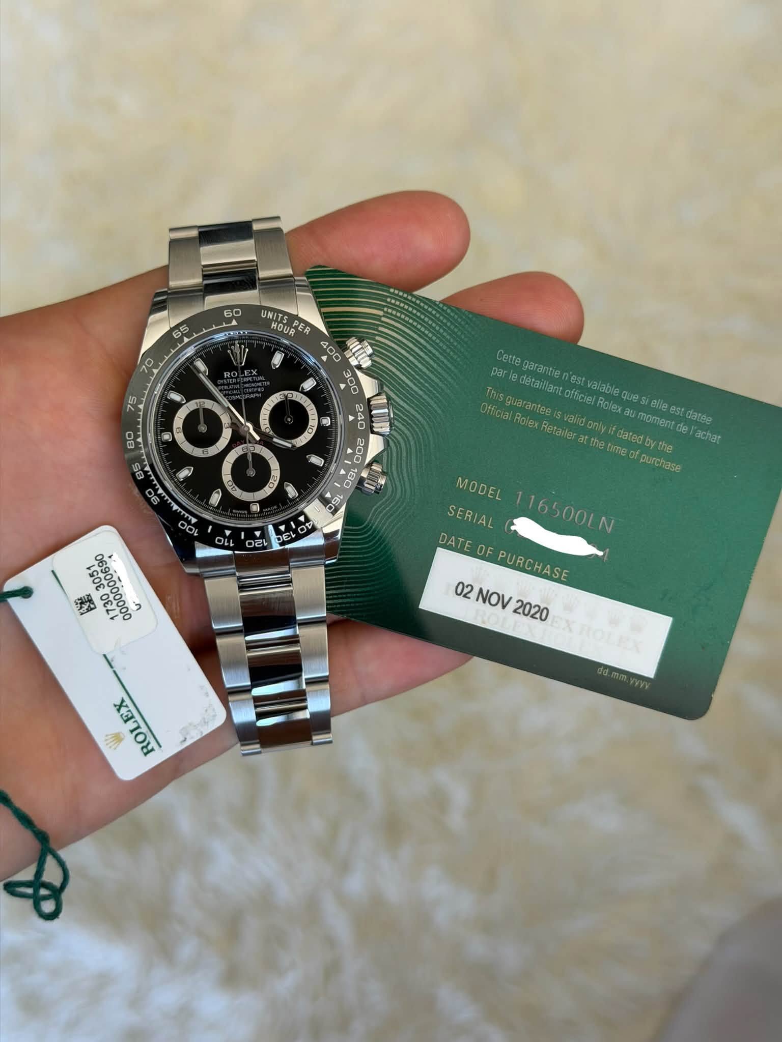 May be an image of wrist watch and text that says '60 UNITS MOUR HOUR PER PER TL m 02 Cette garantie par Official Rolex Retailer atthe time ofpurchase hisquarantee officiel Role…