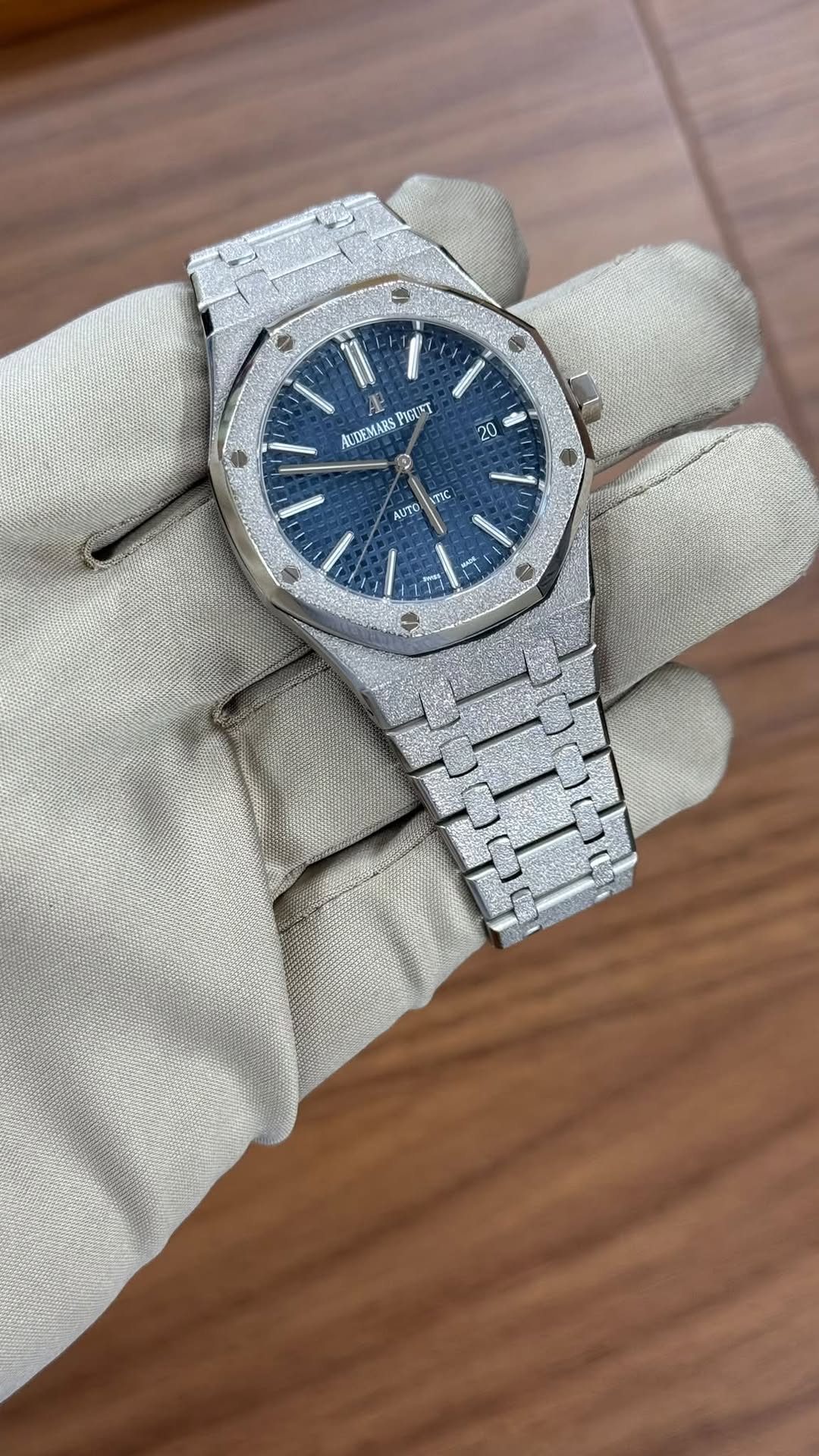 May be an image of wrist watch and text