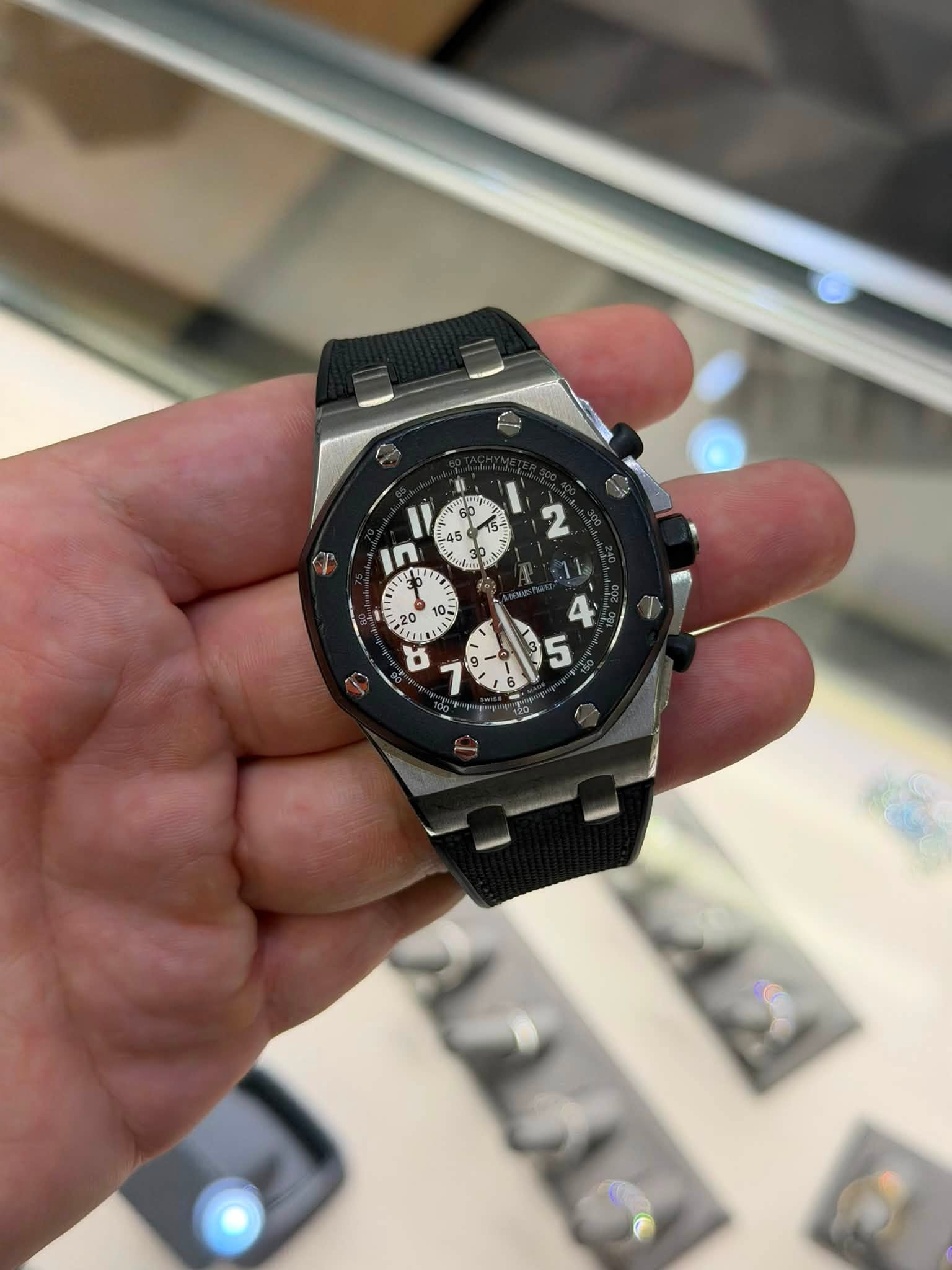 May be an image of wrist watch and text