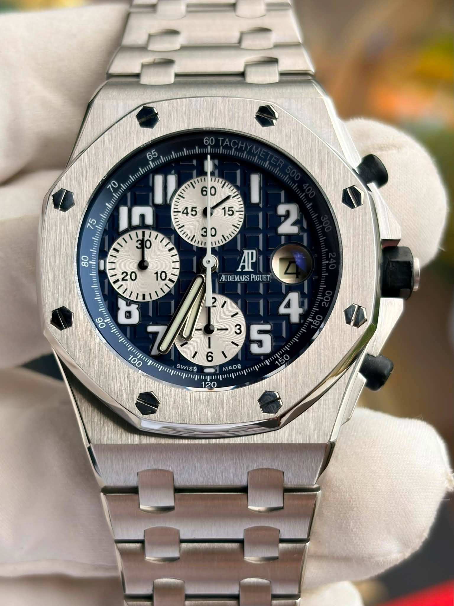 May be an image of wrist watch and text