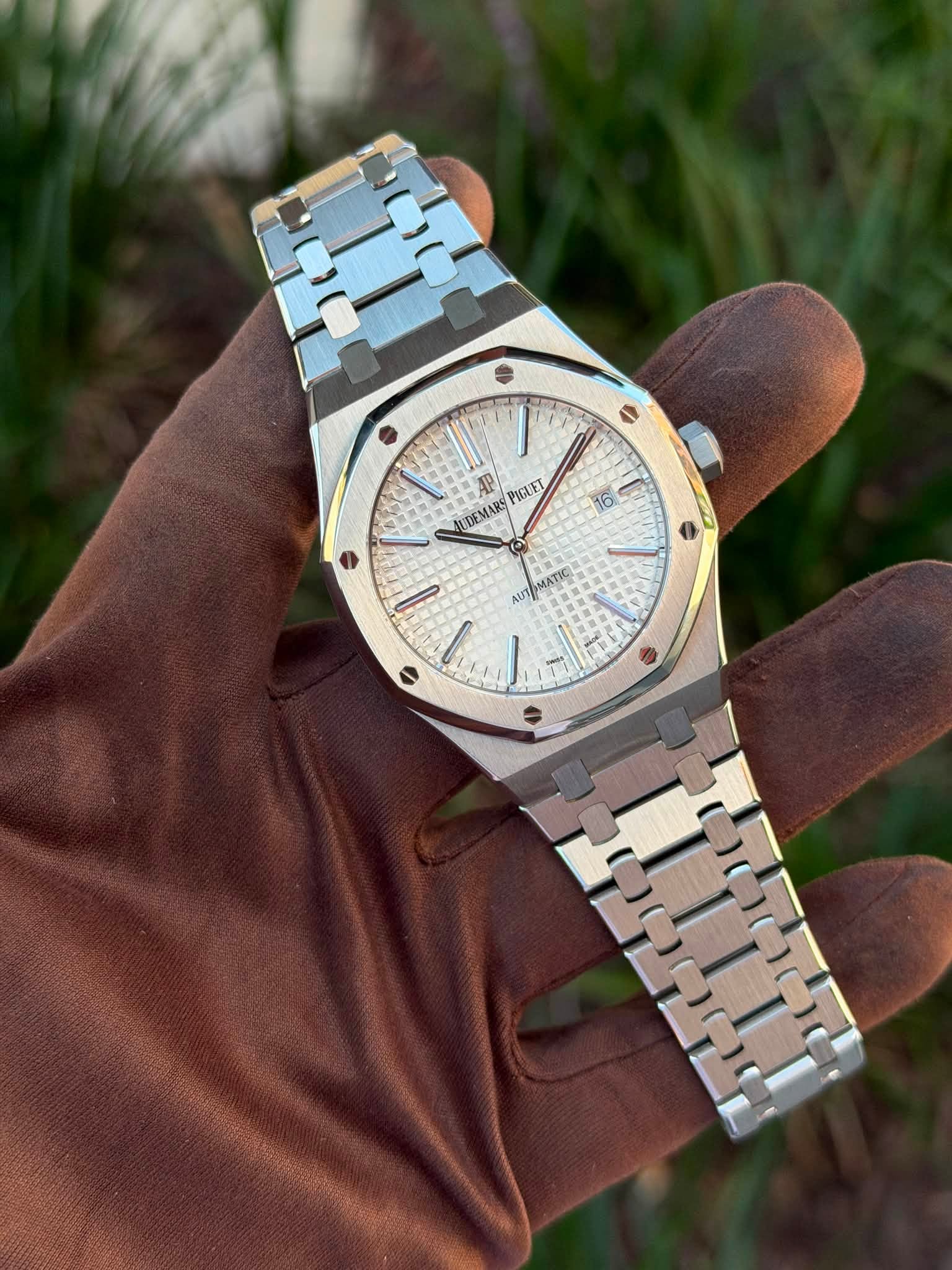 May be an image of wrist watch and text