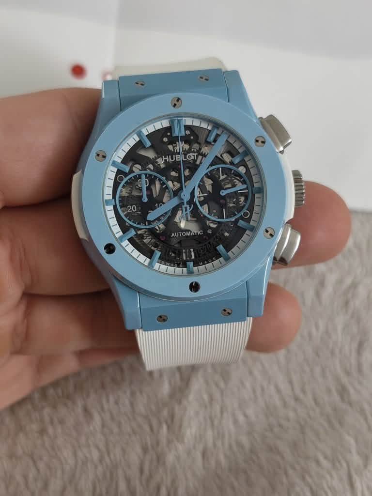May be an image of wrist watch and text