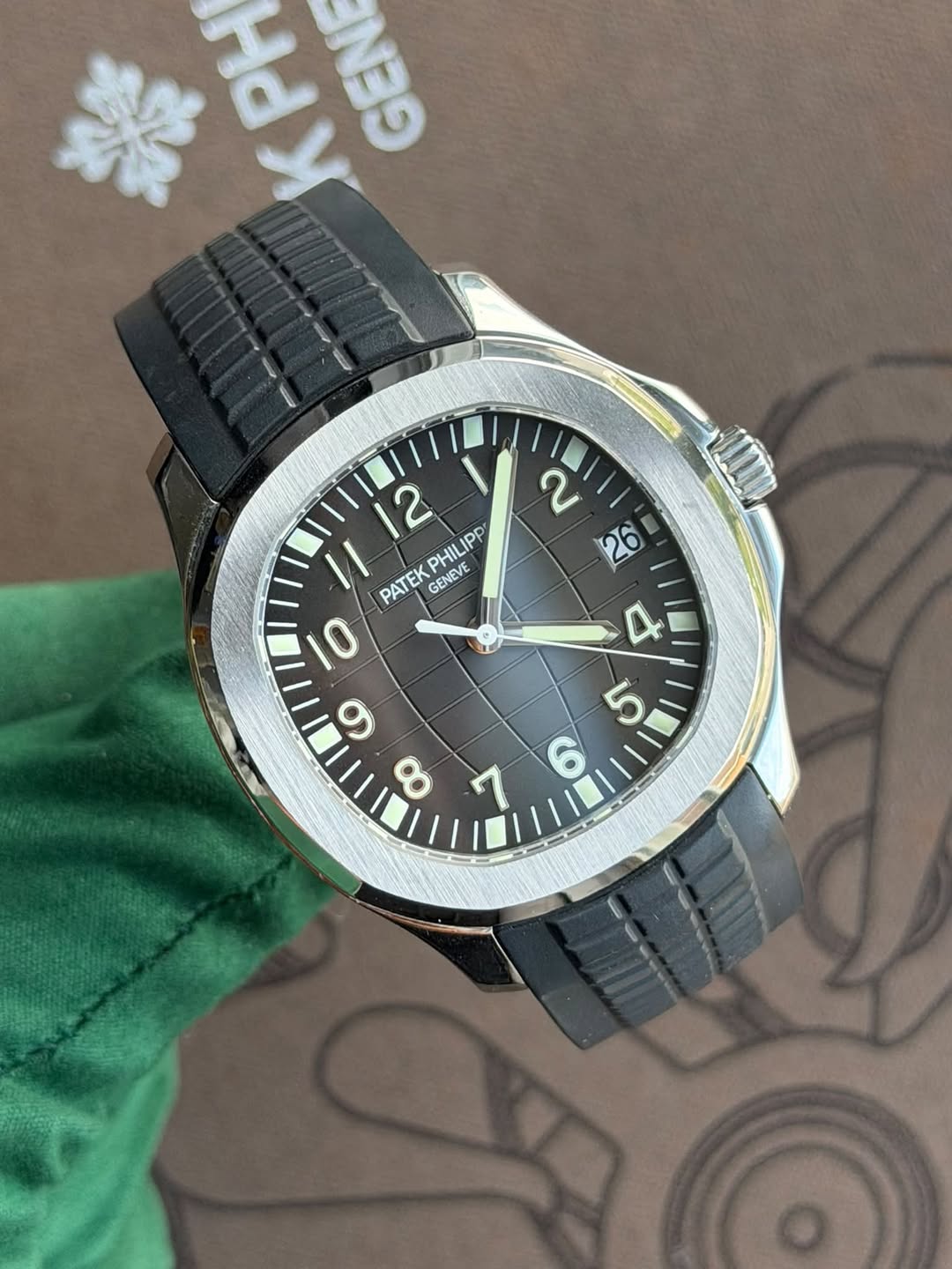 May be an image of wrist watch and text
