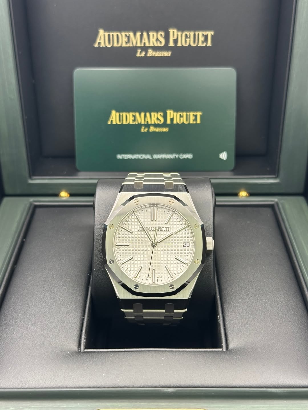 May be an image of wrist watch and text