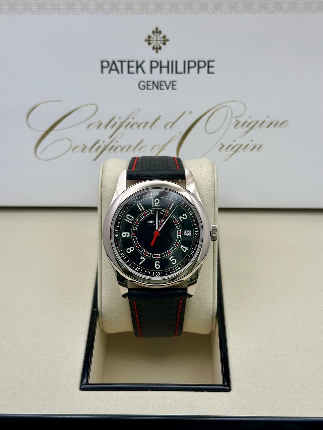 May be an image of wrist watch and text