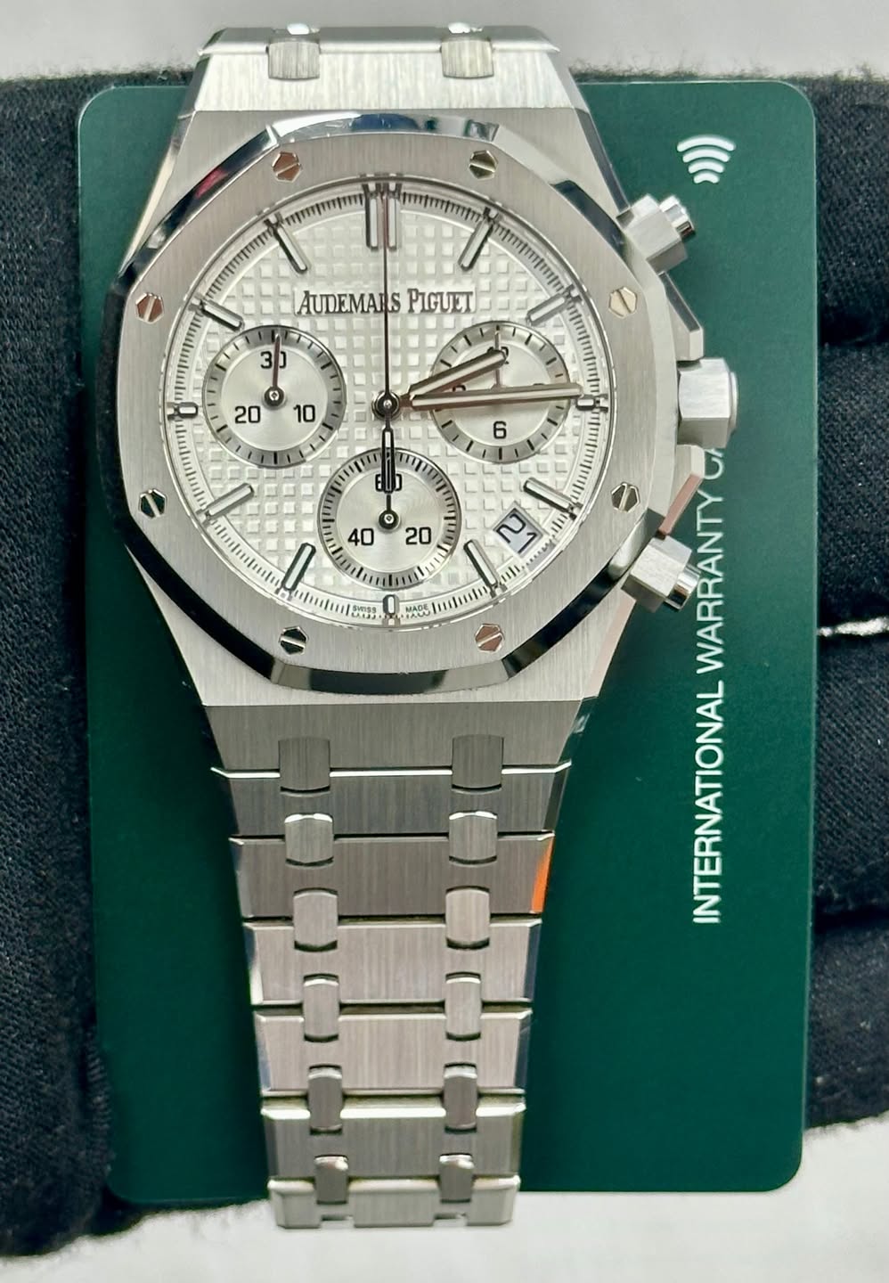 May be an image of wrist watch and text